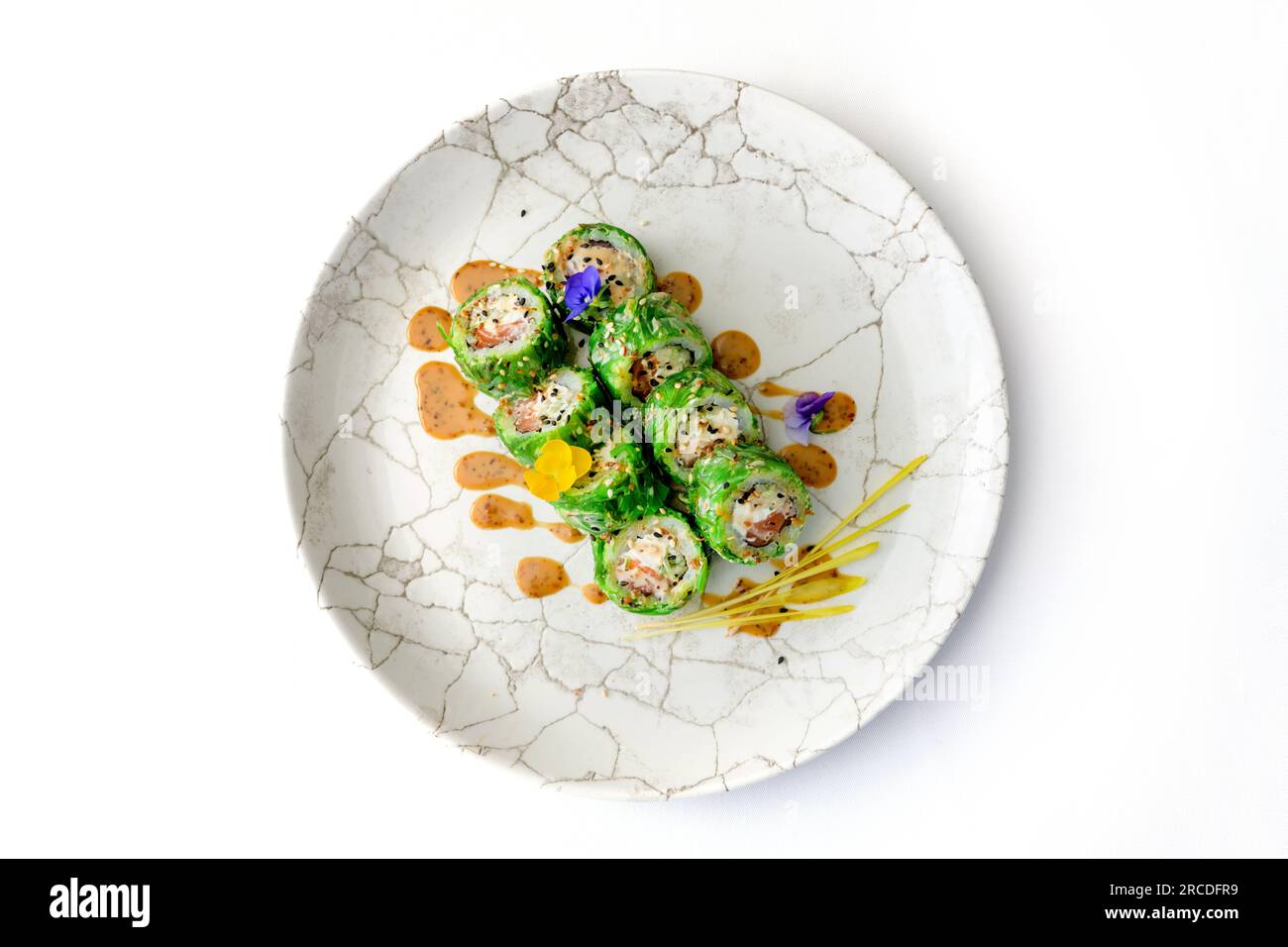 Sushi Roll Maki Sushi with wakame, Crab meat, avocado, cream cheese