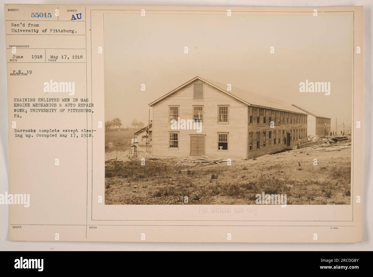 Enlisted men at University of Pittsburgh, PA, receiving training in gas engine mechanics and auto repair work. The barracks are mostly completed except for some final cleanup. The photo was taken on May 17, 1918, shortly after the occupation of the university. Stock Photo