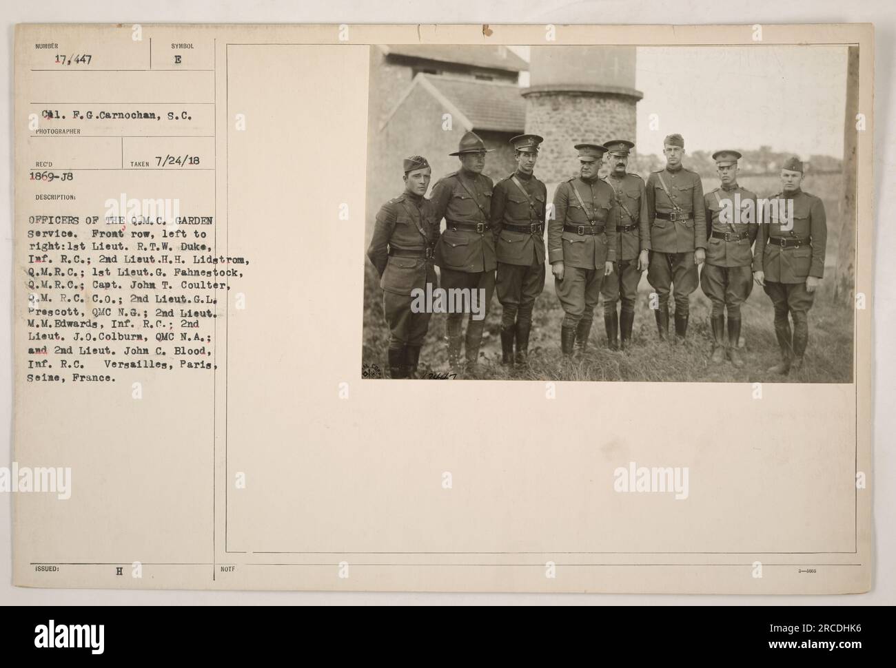 Officers of the Q.M.C. Garden service posing for a photograph in Versailles, Paris, Seine, France on July 24, 1918. Front row from left to right: 1st Lieut. R. T. W. Duke, Inf. R.C.; 2nd Lieut.H.H. Lidstrom, Q.M.R.C.; 1st Lieut. G. Pahnestock, Q.M.R.C.; Capt. John T. Coulter, Q.M. R.C. C.0; 2nd Lieut. G. L Prescott, QMC N.G.; 2nd Lieut. M.M. Edwards, Inf. R.C.; 2nd Lieut. J.0. Colburn, QMC N. A.; and 2nd Lieut. John C. Blood, Inf. R.C. Stock Photo