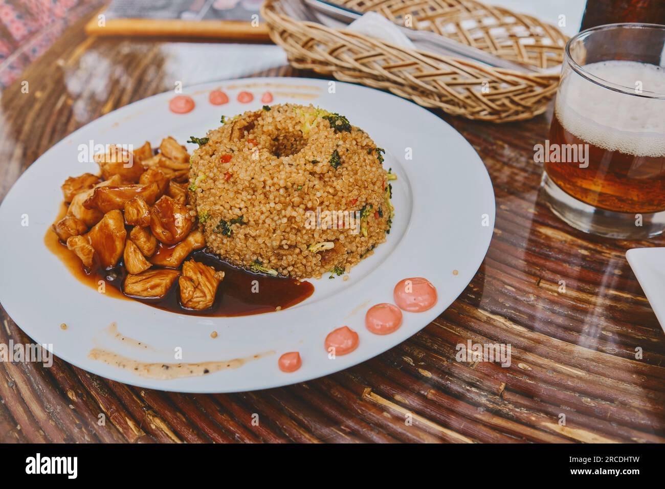Traditional peruvian quinoa quinua chaufa and chicken, Food Stock Photo