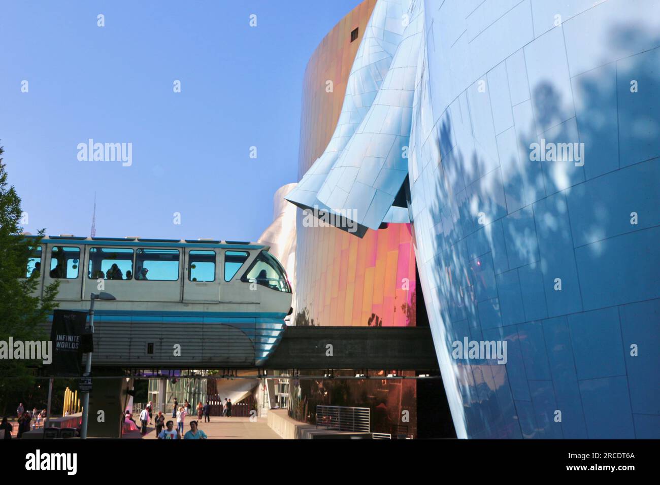 Museum of Pop Culture modern architecture building with the Seattle Centre Alweg Monorail train running through it Seattle Washington State USA Stock Photo