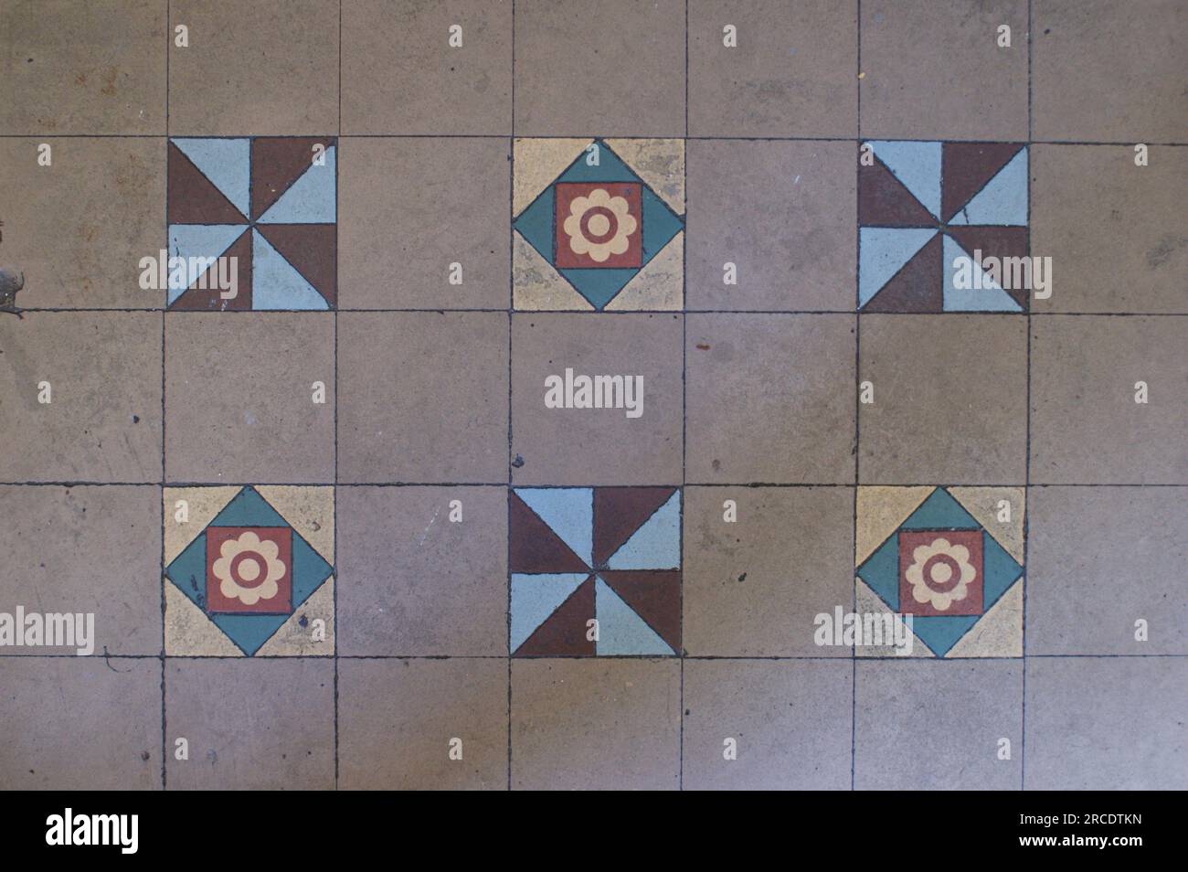 Very old tiles with different symbols. Old flor tiles Stock Photo Alamy