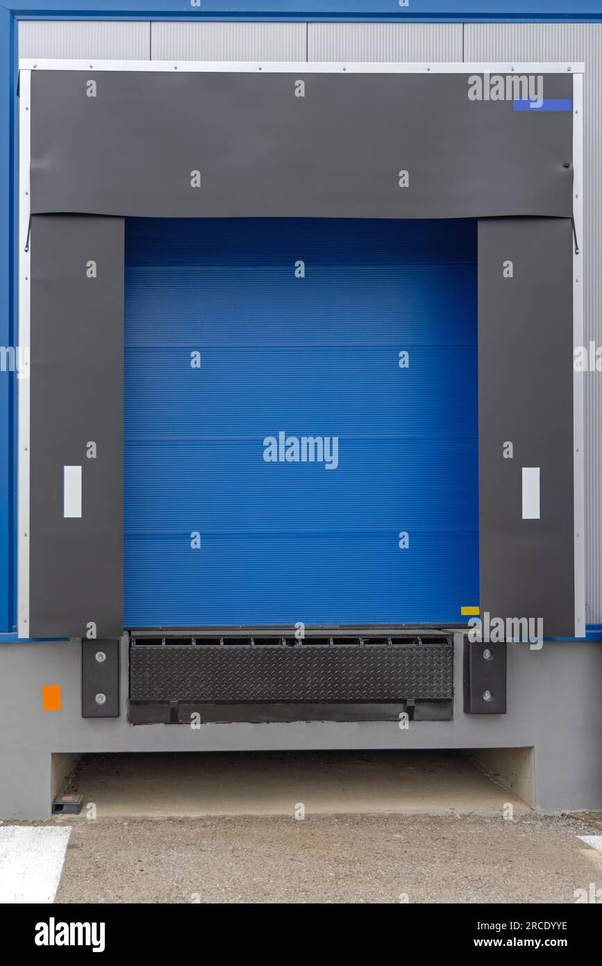 Loading Ramp Dock Roll Door at Distribution Warehouse Stock Photo Alamy