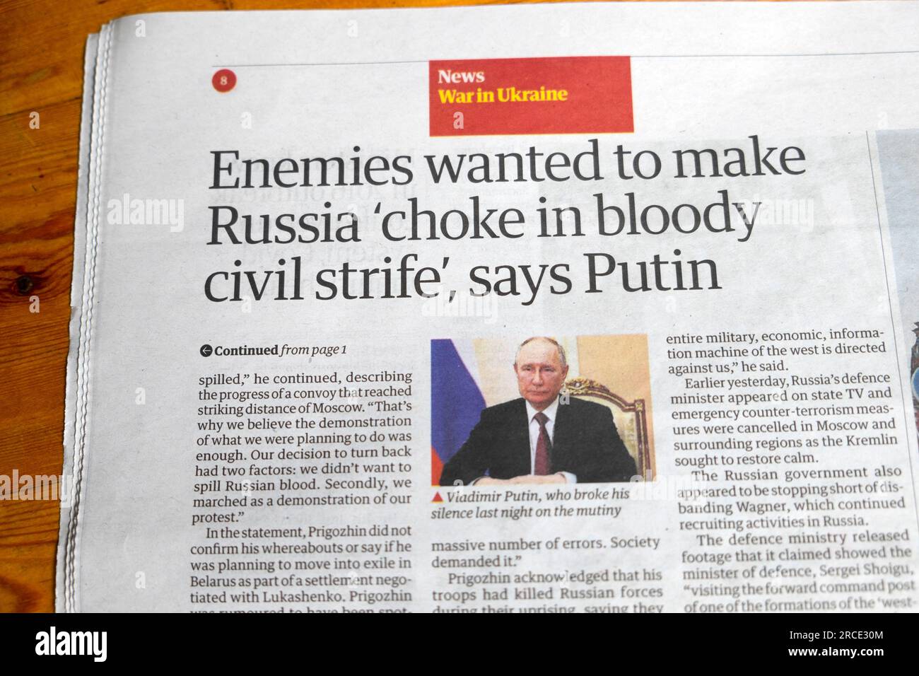 'Enemies wanted to make Russia choke in bloody civil strife', says Putin' Guardian newspaper headline War in Ukraine article on 27 June 2023 London UK Stock Photo
