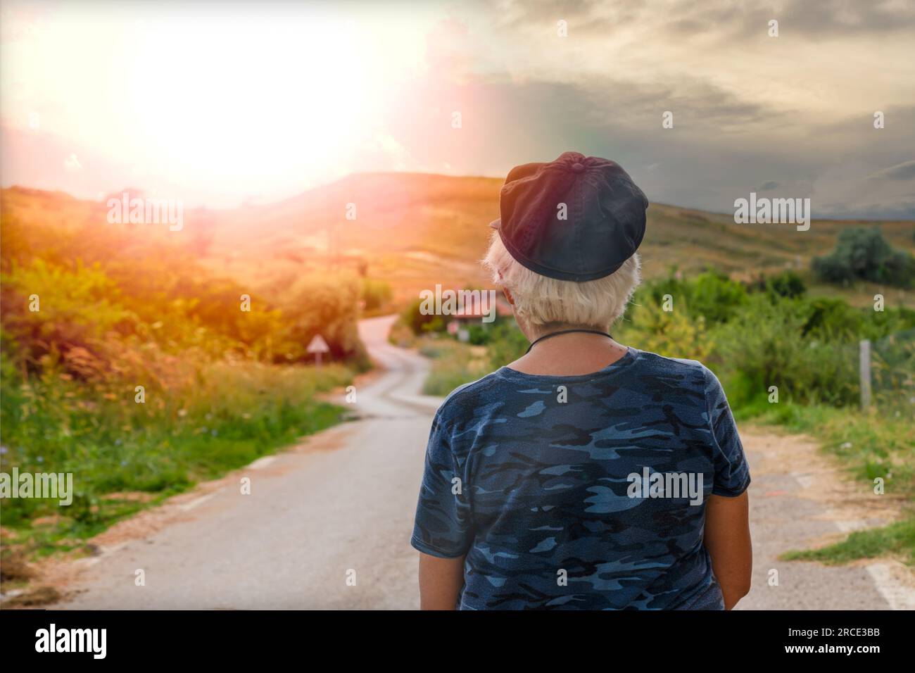 Person in green hat hi-res stock photography and images - Alamy