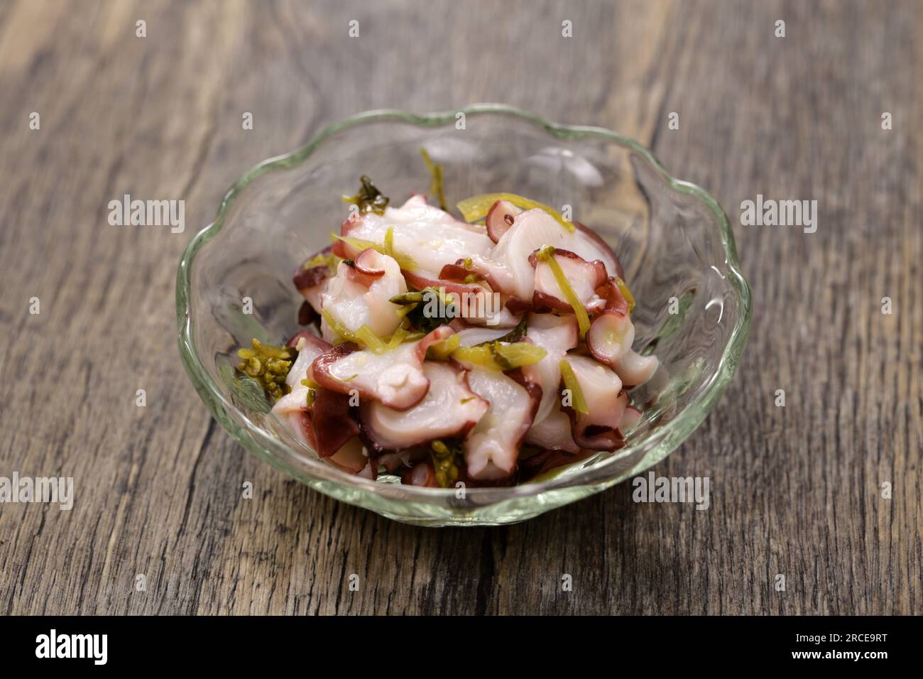 homemade Tacowasa (marinated octopus and wasabi leaves and stems), Japanese popular food Stock Photo
