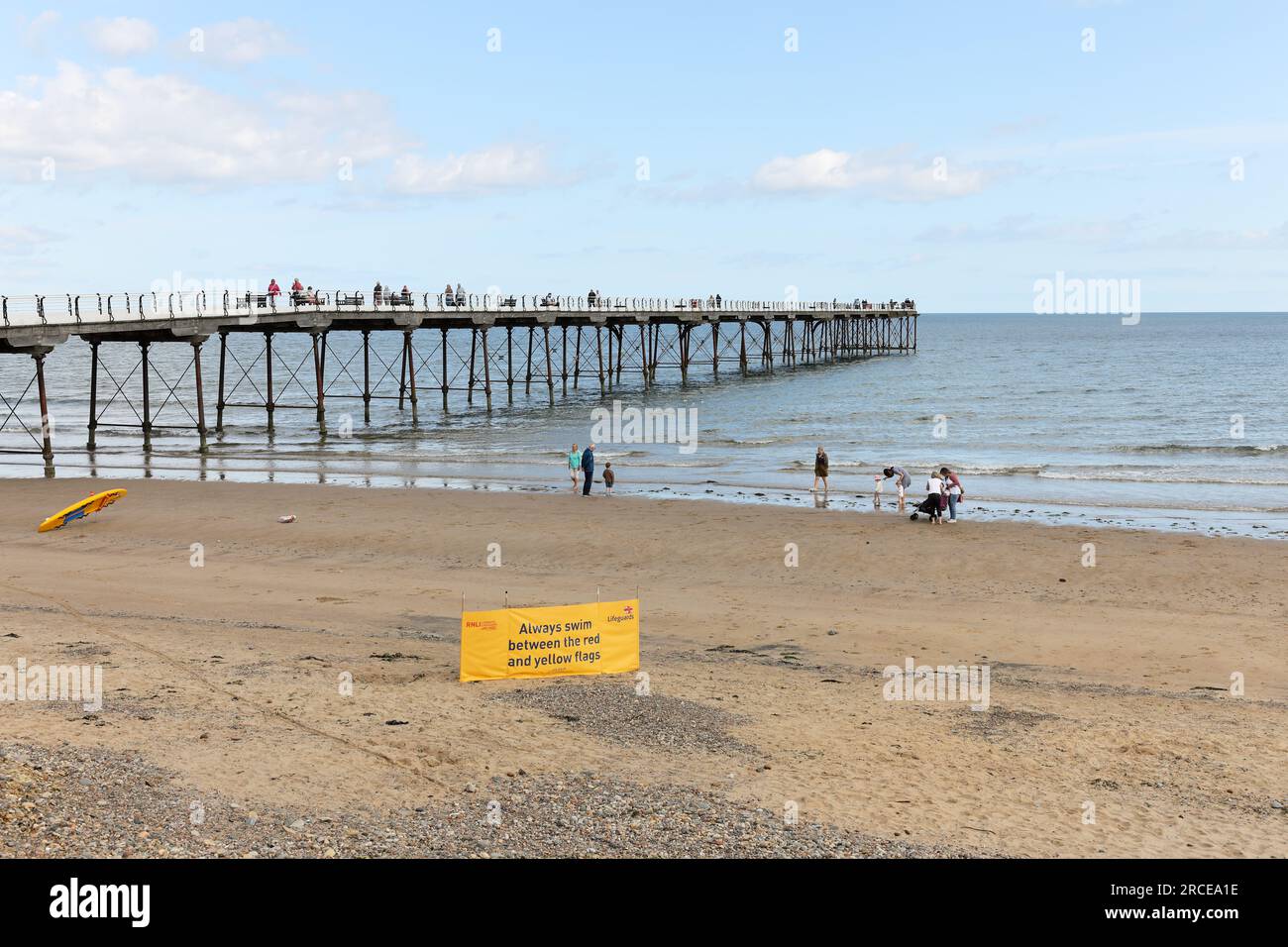 Saltburn Pier with RNLI Lifeguard Swimming Information Banner, Saltburn