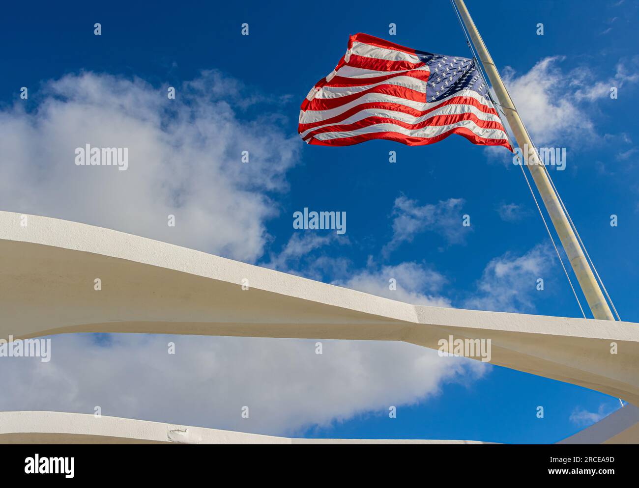 American Flag From The Interior of The USS Arizona Memorial, Pearl Harbor National Memorial,  Oahu Hawaii, USA Stock Photo