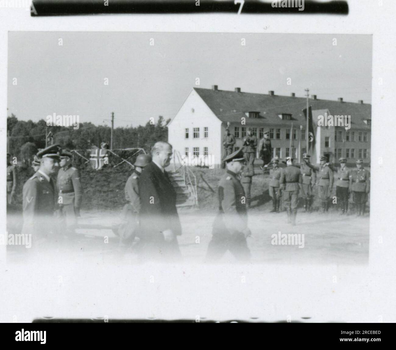 SS Photographer Eines Norwegian SS 1943 Field training, enlistment ceremony, winter scenes with soldiers in village   Images depicting the front-line activities of Waffen-SS units on the Western and Eastern Fronts, including Poland, France, Balkans, Italy, and Russia, as well as training exercises, portraits of individuals and group views, and scenes of cities and towns, and local populations. Stock Photo