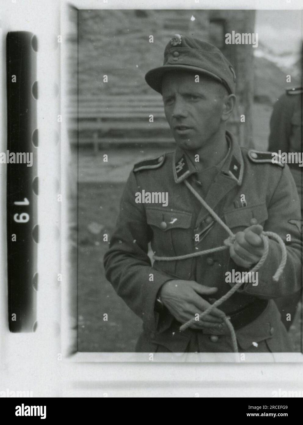 SS Photographer, Fink ,1943 & 1944 Funeral procession, Reinhard Heydrich, artist sculpting bust of Heydrich,  Heinrich Himmler, soldiers training with rocket launcher, ski troops training in mountains, bridging operation in mountains. Images depicting the front-line activities of Waffen-SS units on the Western and Eastern Fronts, including Poland, France, Balkans, Italy, and Russia, as well as training exercises, portraits of individuals and group views, and scenes of cities and towns, and local populations. Stock Photo