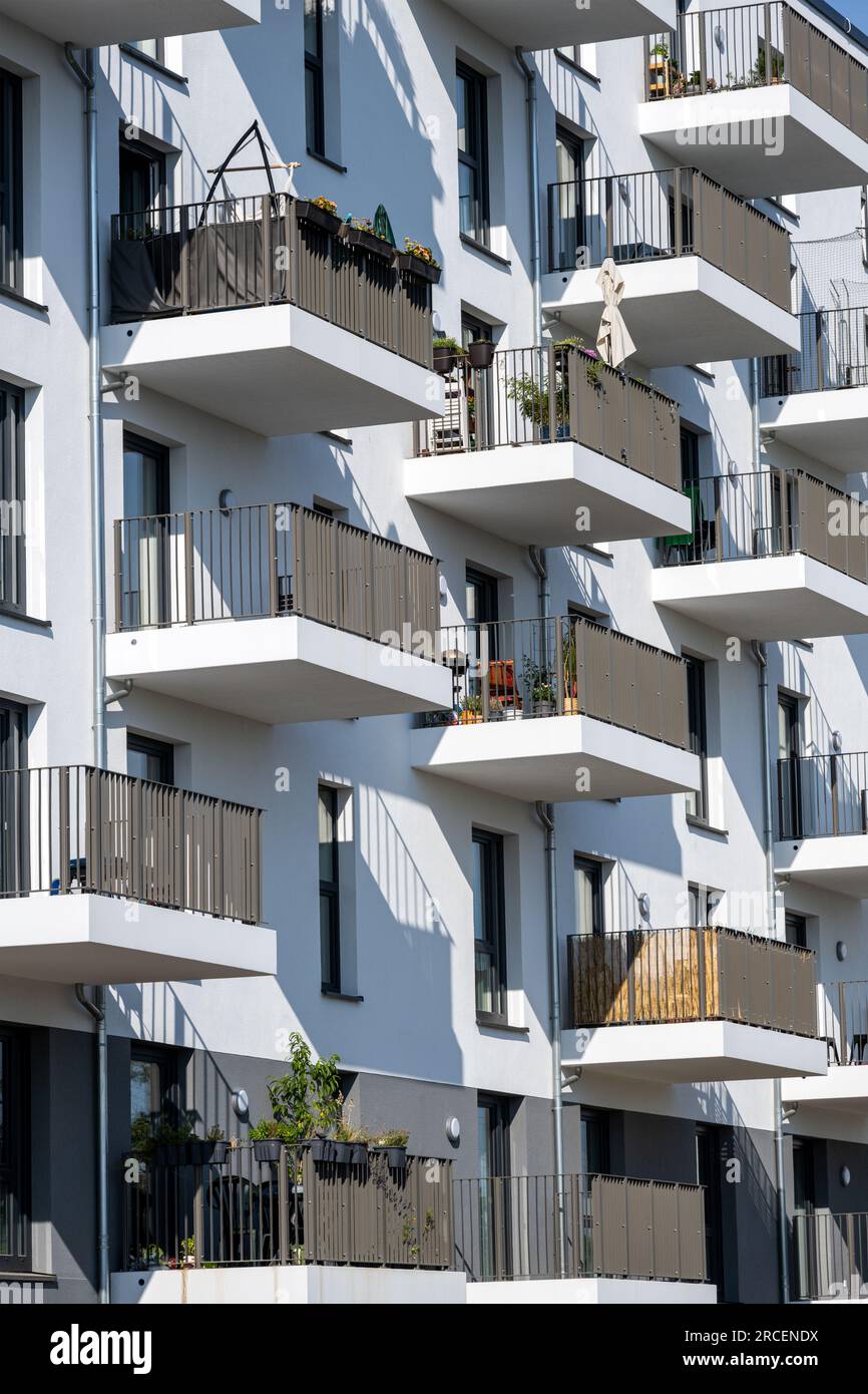 The facade of a modern white apartment building seen in Berlin, Germany Stock Photo