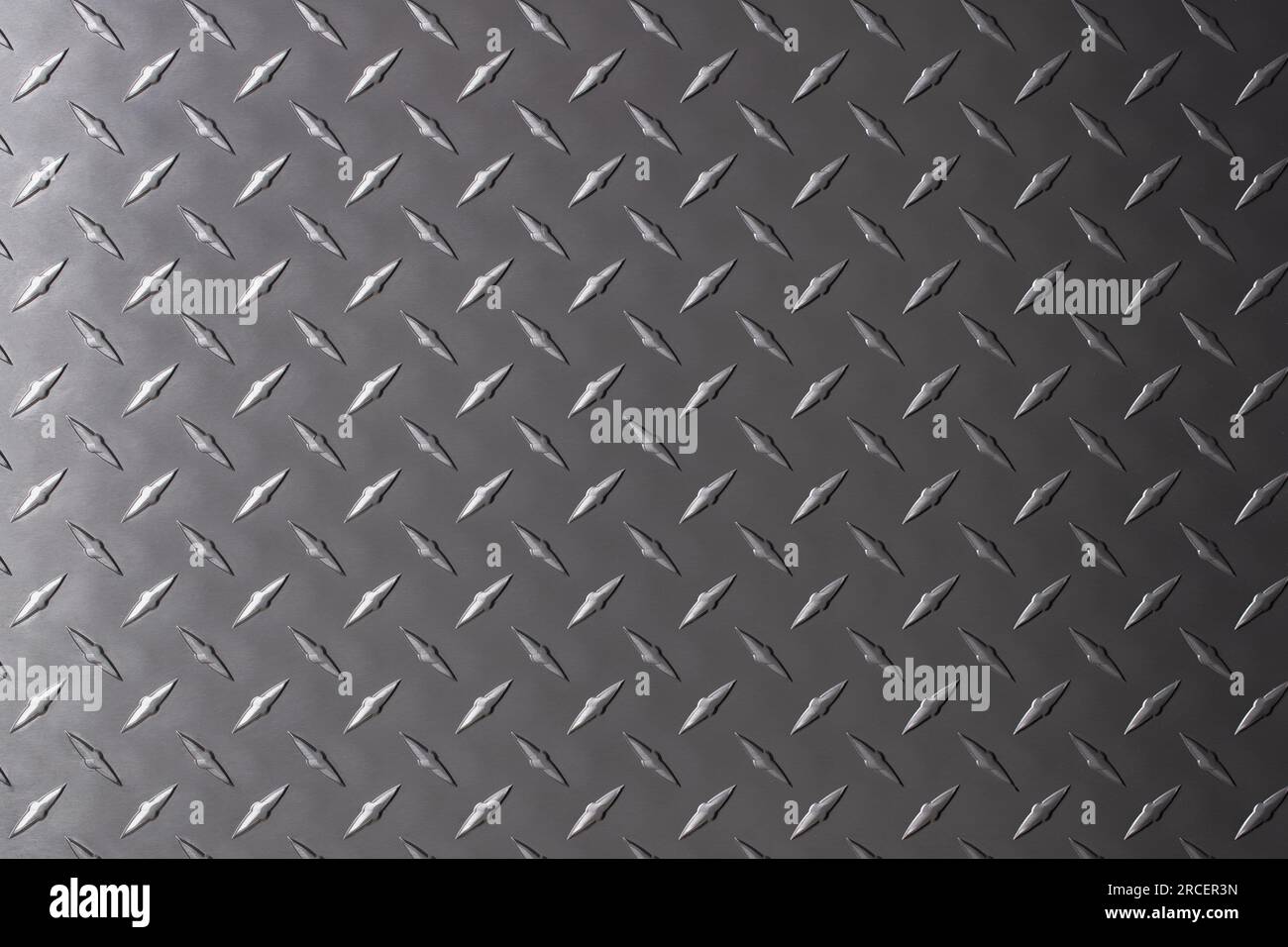 dark metal texture with rhombus pattern, iron sheet as background Stock Photo