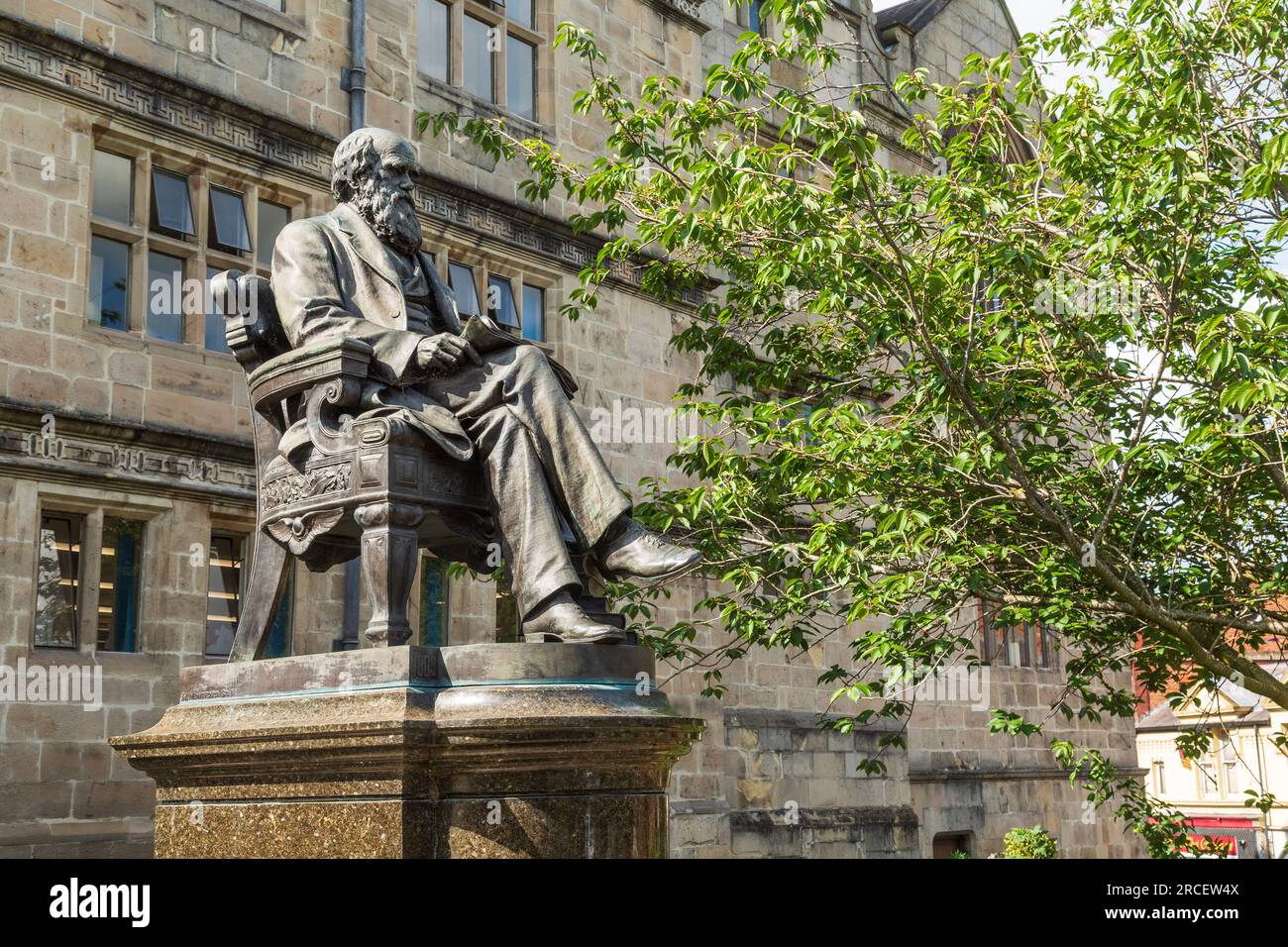 Statue of Charles Darwin outside the Shrewsbury Library, Shrewsbury, Shropshire, UK Stock Photo