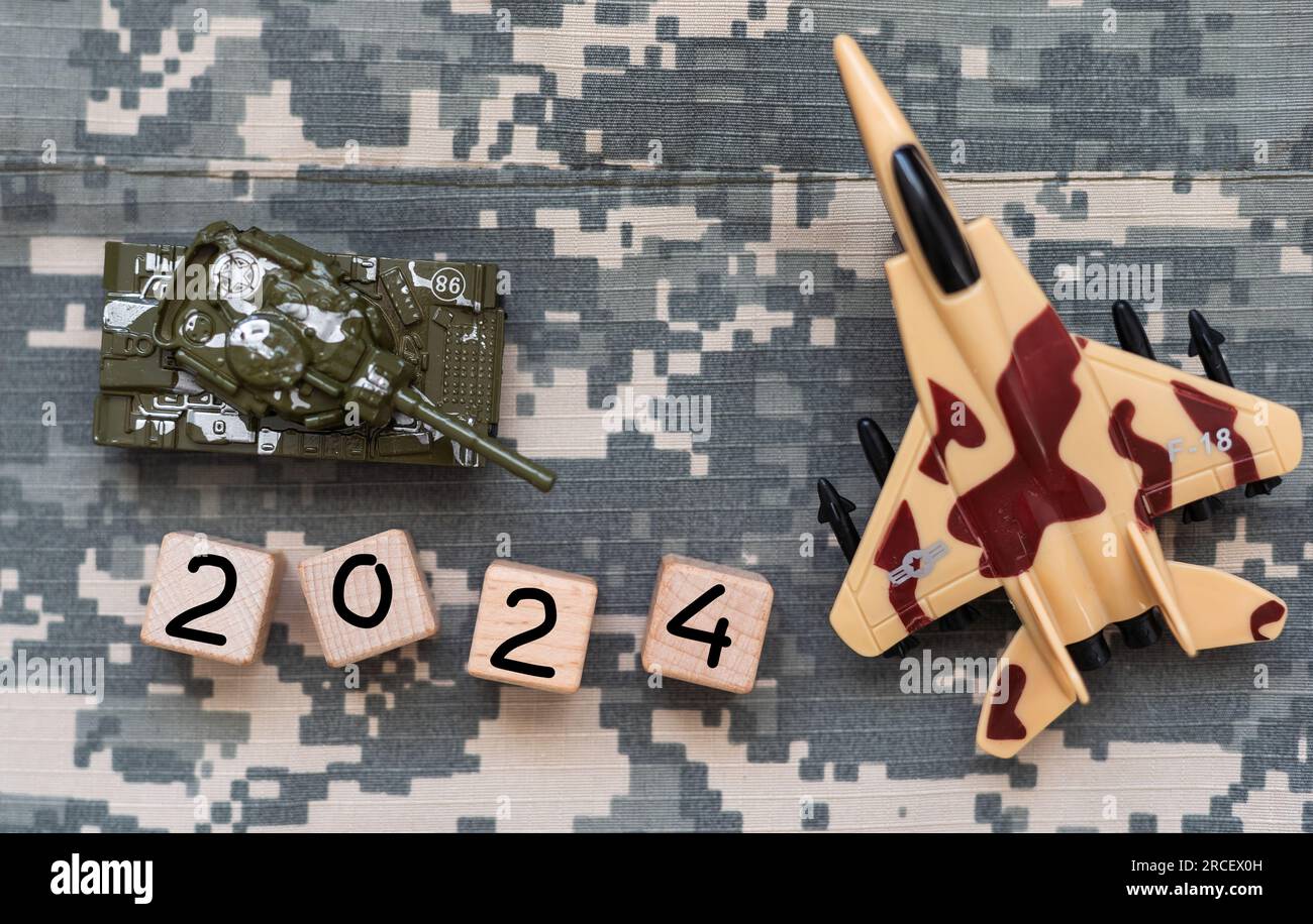 Word 2024 written by wooden cubes with american flag and american dollar bills Stock Photo Alamy