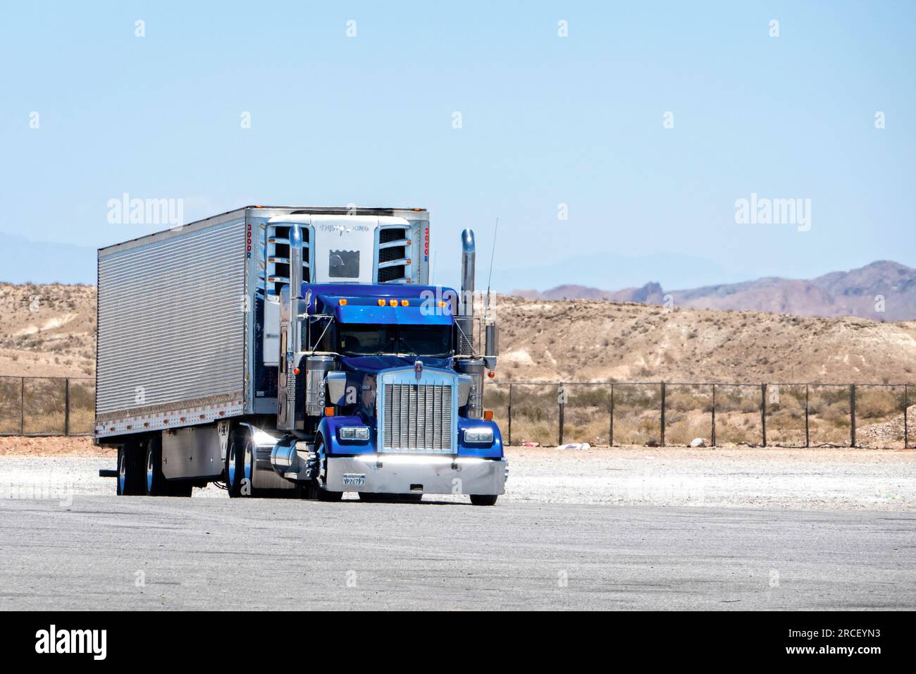 Kenworth American Semi conventional trucks at a truck stop in Nevada USA Stock Photo