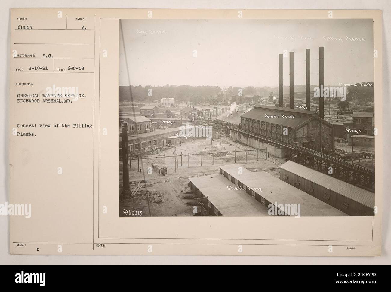'General view of the Filling Plants at Edgewood Arsenal, Maryland, operated by the Chemical Warfare Service. This photograph, taken on June 20, 1918, shows the Filling Plants in operation, with a shell pump power plant in the foreground. Photographer: S.C. Description: Issued Symbol A. Chemical Warfare Service. Edgewood Arsenal, MD.' Stock Photo