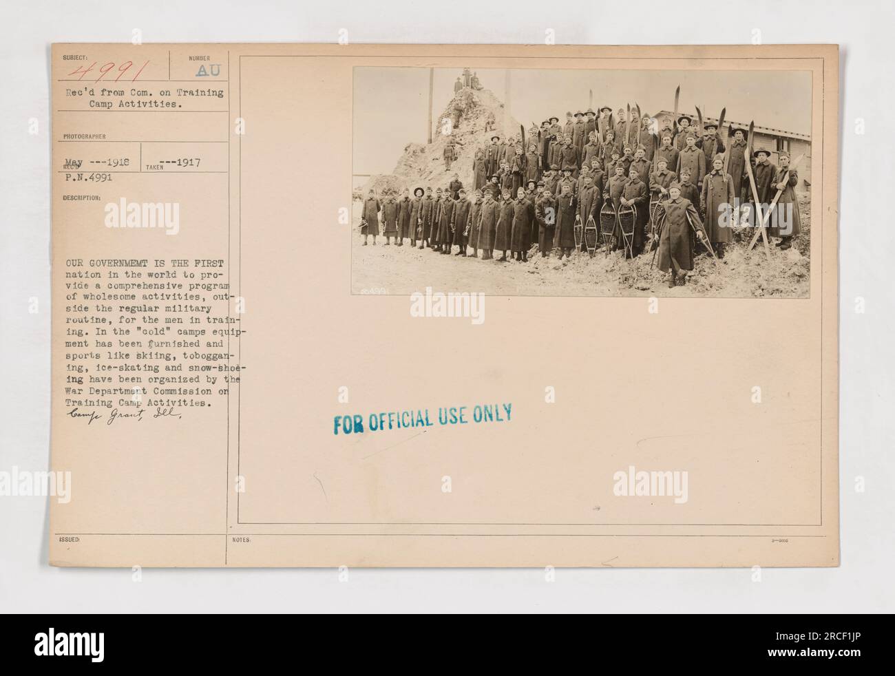 Soldiers engaged in winter activities, including skiing, tobogganing, ice-skating, and snowshoeing, organized by the War Department Commission on Training Camp Activities in 1917. This program provided recreational opportunities for soldiers outside of their military duties, making the United States the first country to offer such comprehensive activities for its military personnel. Image number: 111-SC-4991. Stock Photo