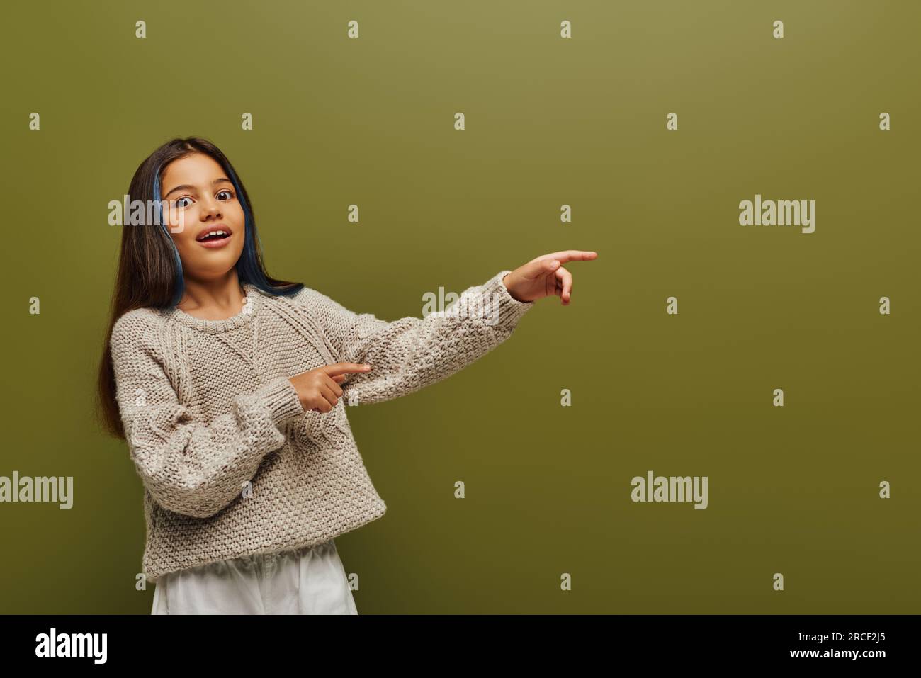 Excited brunette preteen girl hi-res stock photography and images - Alamy