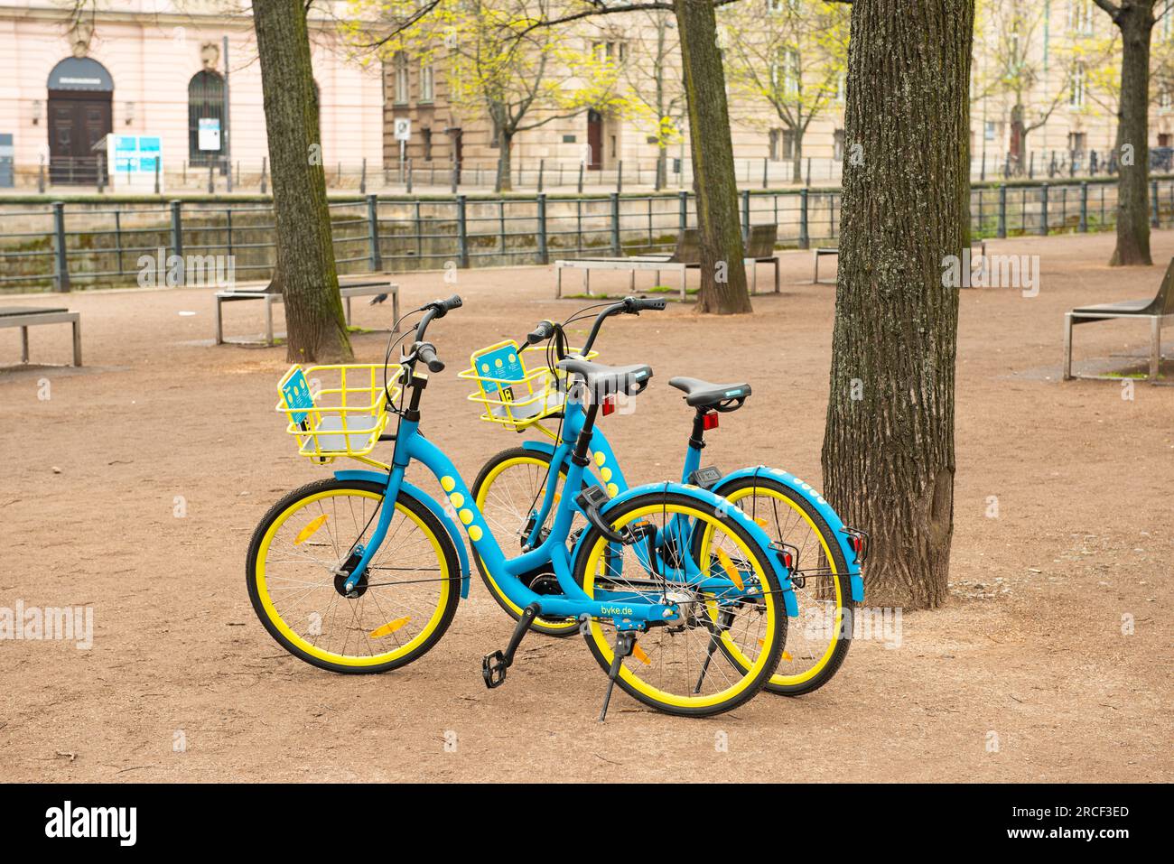 Yellow And Blue Rides Blue bicycles hi-res stock photography and images - Alamy
