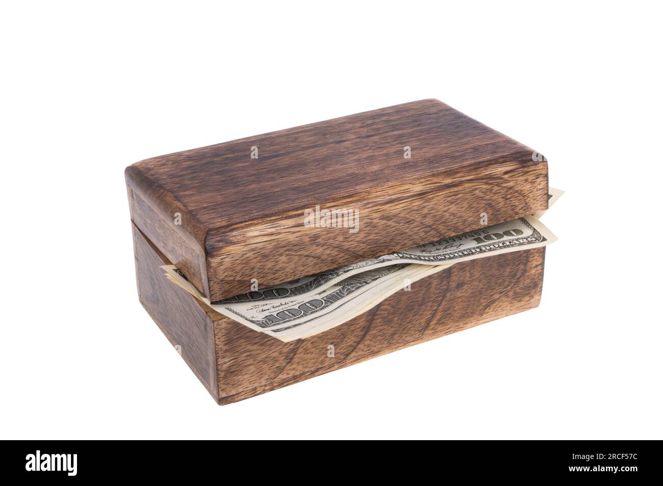 Dollar In Box dollars in wooden box isolated on white background Stock Photo - Alamy