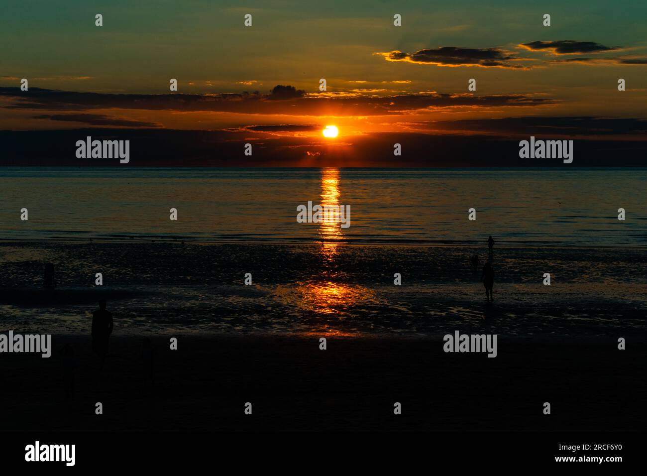 Scenic landscape photo of the sunset by the sea Stock Photo - Alamy