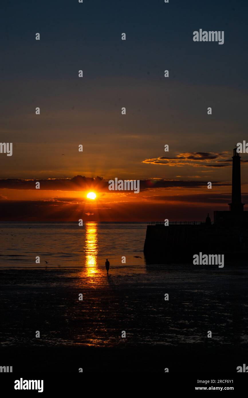 Scenic landscape photo of the sunset by the sea Stock Photo - Alamy