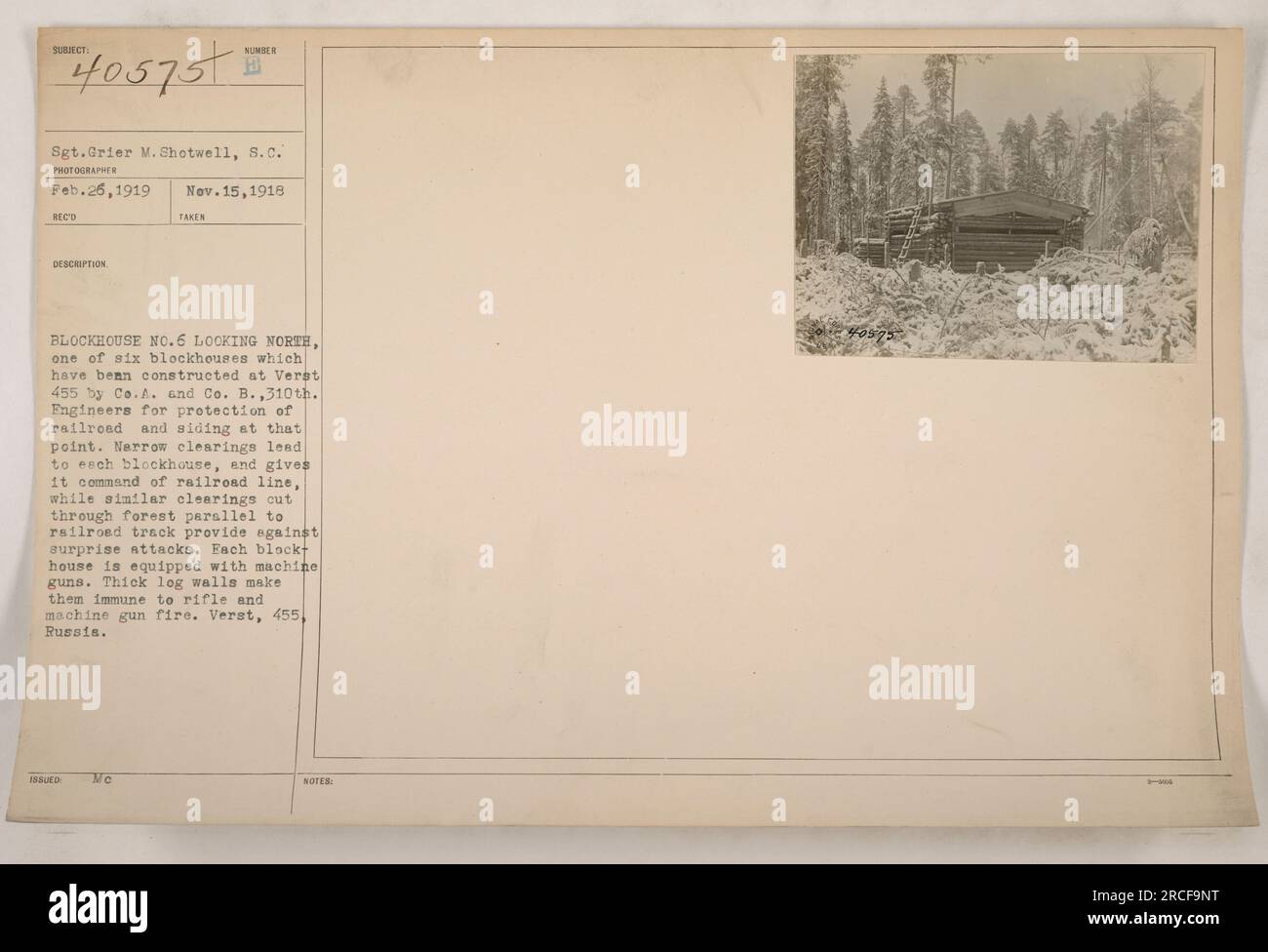 Sgt.Grier M. Shotwell examined Blockhouse No.6 on Feb. 26, 1919. It was one of six blockhouses built at Verst 455 by Co.A. and Co. B., 310th Engineers to secure the railroad and siding. Clearings around the blockhouse commanded the railroad, and additional clearings in the forest provided defense. Each block house had machine guns and thick log walls for protection. This photograph is a part of DESCRIPTION ISSUED NUMBER Me Nov. 15, 1918. Stock Photo