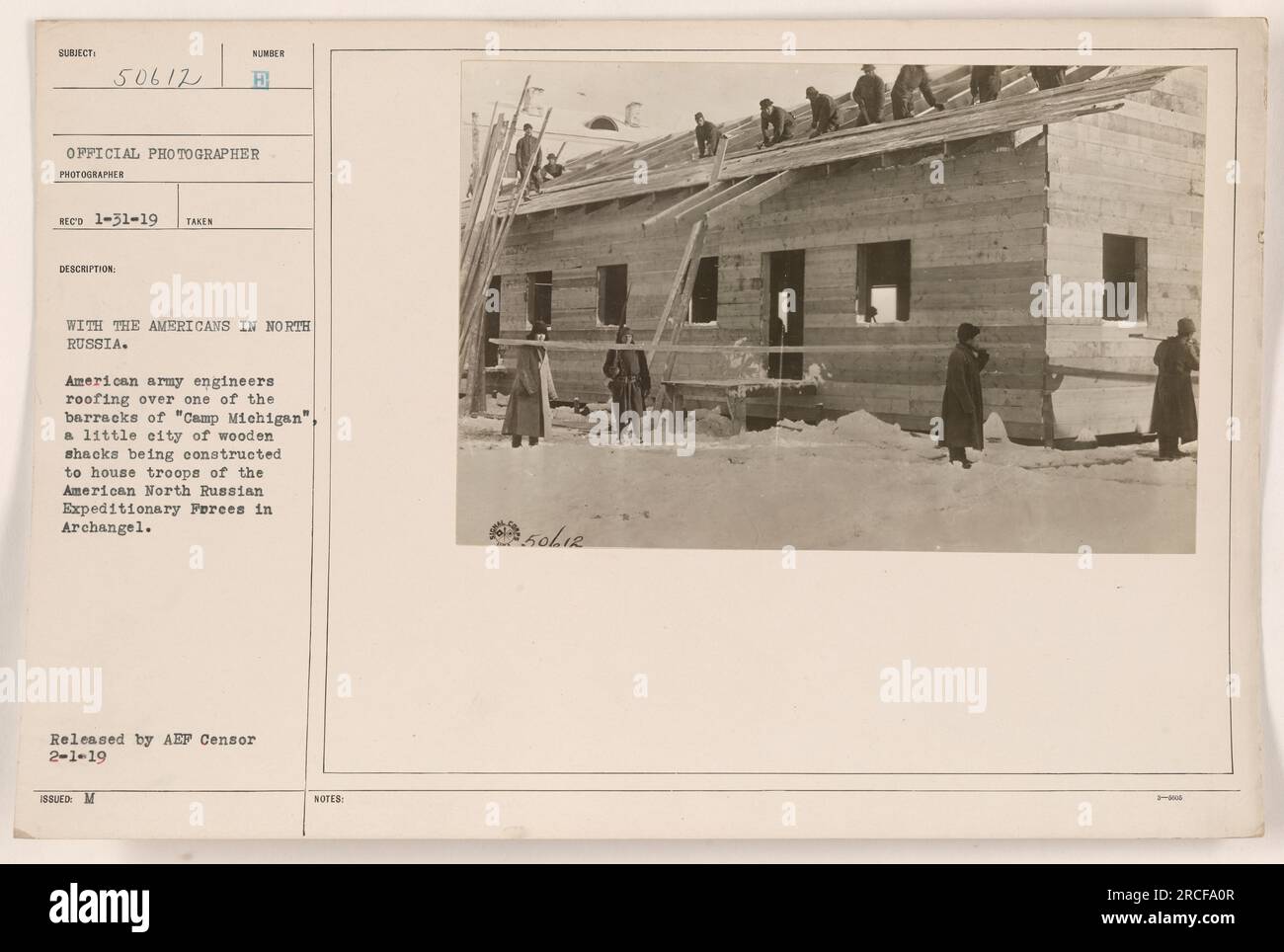 American army engineers working on roofing one of the barracks at 