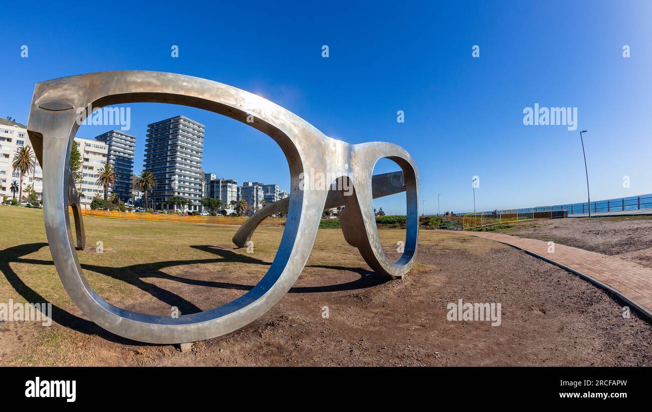 Sunglasses Realistic Large steel framed design sculpture on ocean sea coastline promenade for