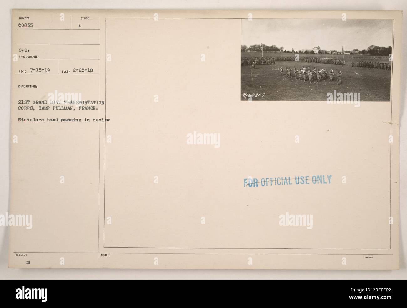 The Stevedore band from the 21st Grand Division Transportation Corps in Camp Pullman, France passes in review. This photograph was taken on February 25, 1918. Confidential symbol issued on July 15, 1919. Official use only. Stock Photo