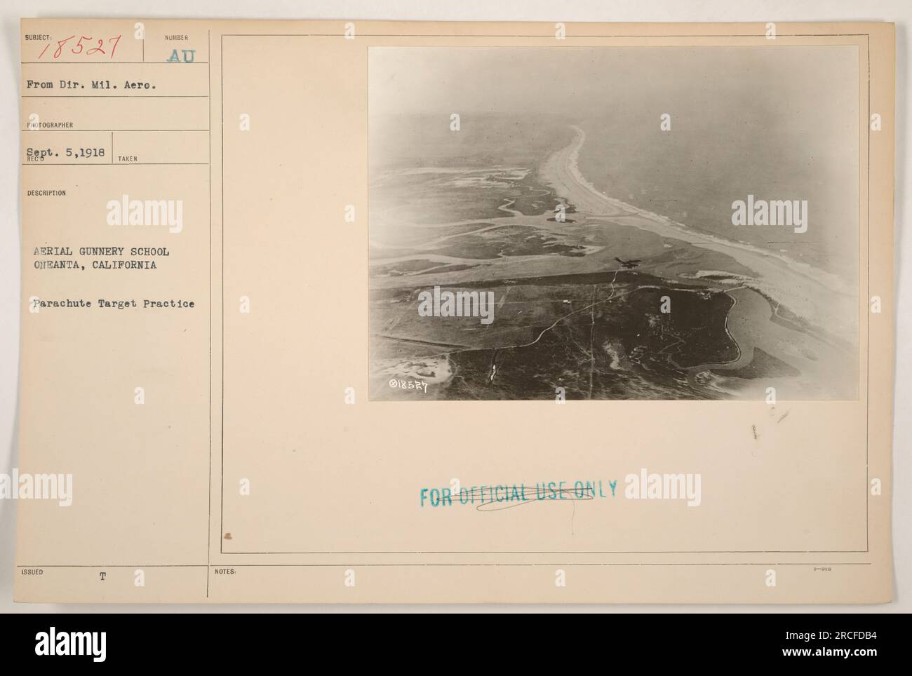 Image showcases an aerial gunnery school in Oneanta, California during World War I. The photograph depicts parachute target practice, which was a crucial aspect of training for military personnel. The image is dated September 5, 1918, and is classified for official use only. Stock Photo