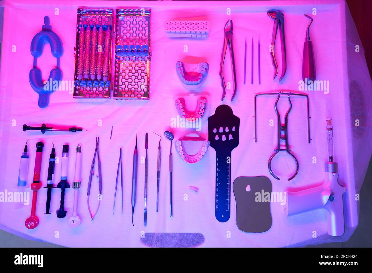 Special dental instruments are laid out for sterilization by infrared ...