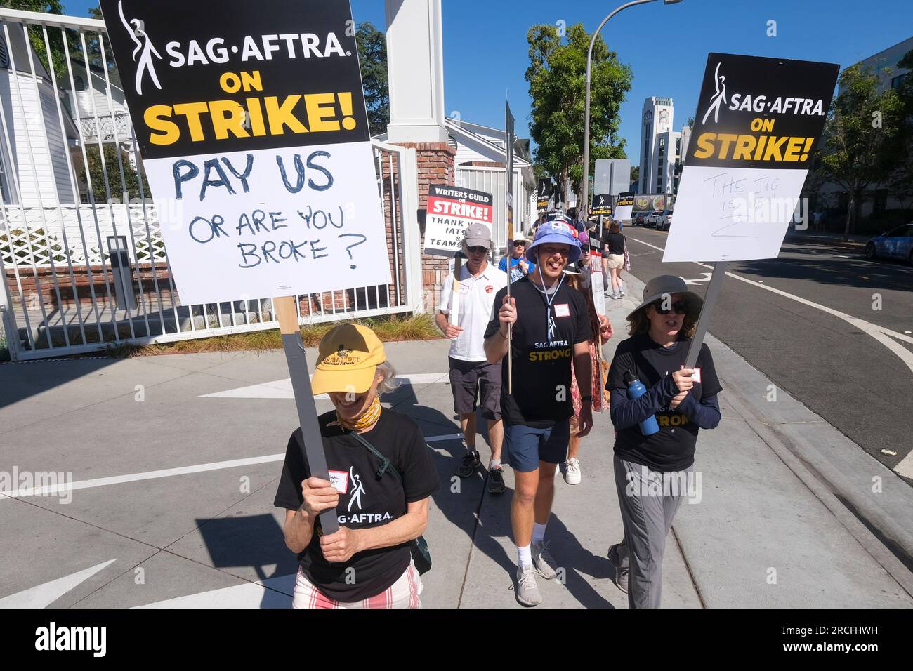 Los Angeles, United States. 14th July, 2023. Striking writers and actors march in picket lines with placards expressing their opinions outside Culver Studios in Culver City. On Thursday, the union's National Board voted unanimously to issue a strike order. The strike order took effect at midnight Thursday, and starting Friday morning, SAG-AFTRA joined picket lines with the Writers Guild of America, which is in the 11th week of its own walkout against the Alliance of Motion Picture and Television Producers. Credit: SOPA Images Limited/Alamy Live News Stock Photo