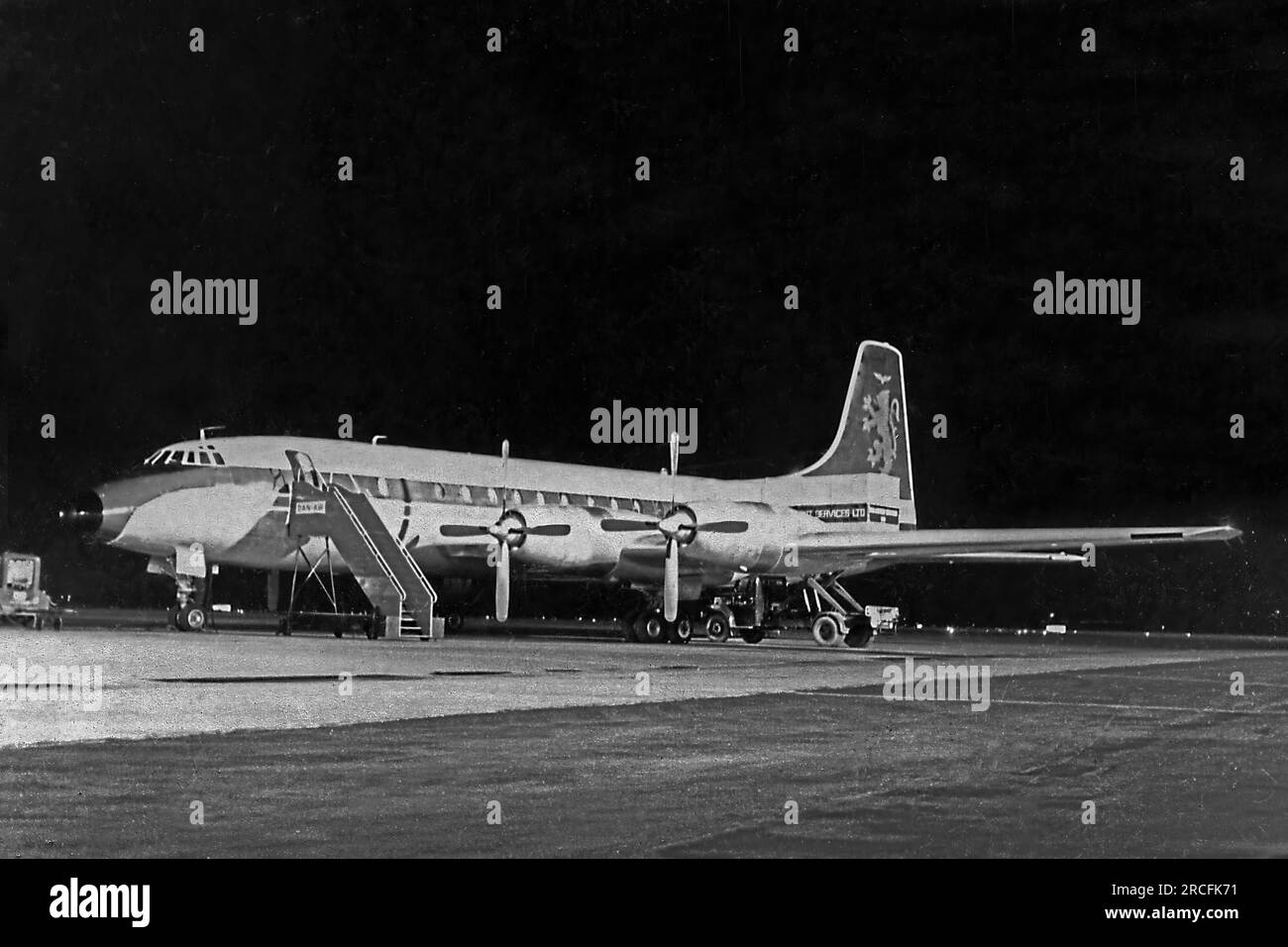 Caledonian airlines plane,nighttime,Gatwick Airport Stock Photo Alamy