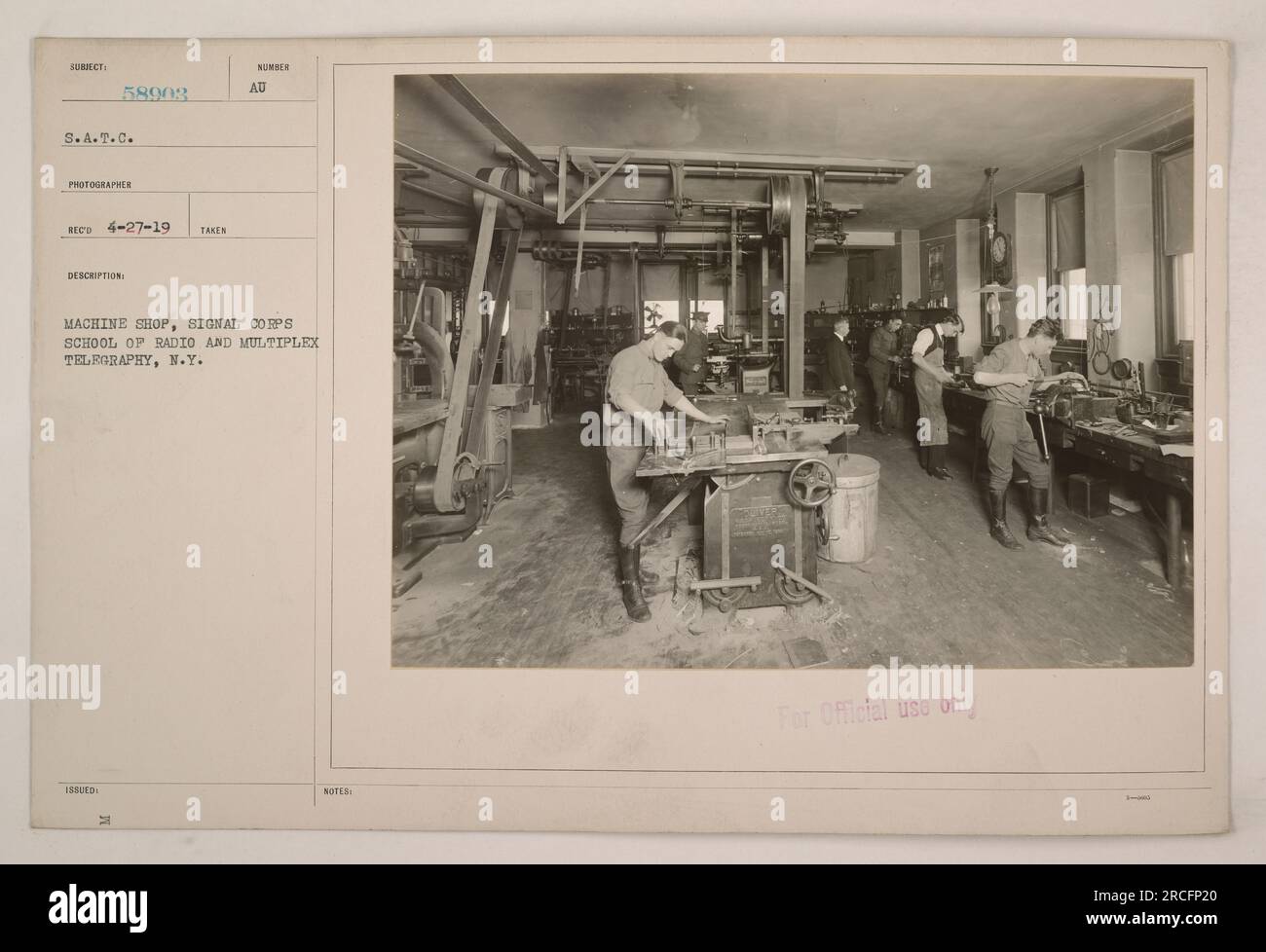 The image shows the machine shop at the Signal Corps School of Radio