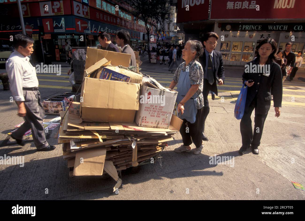 a women at Paper recycling in the city of Hongkong in Hongkong.  China, Hongkong, May, 1999 Stock Photo