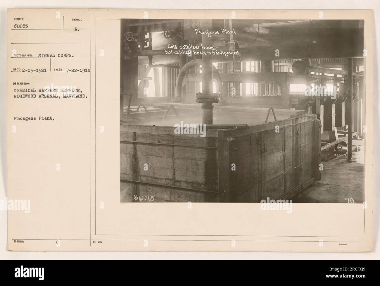 The image shows the Phosgene Plant at the Edgewood Arsenal in Maryland, operated by the Chemical Warfare Service during World War I. The photo was taken on July 22, 1918. In the foreground, cold catalyzer boxes can be seen, with hot catalyzer boxes in the background. Stock Photo