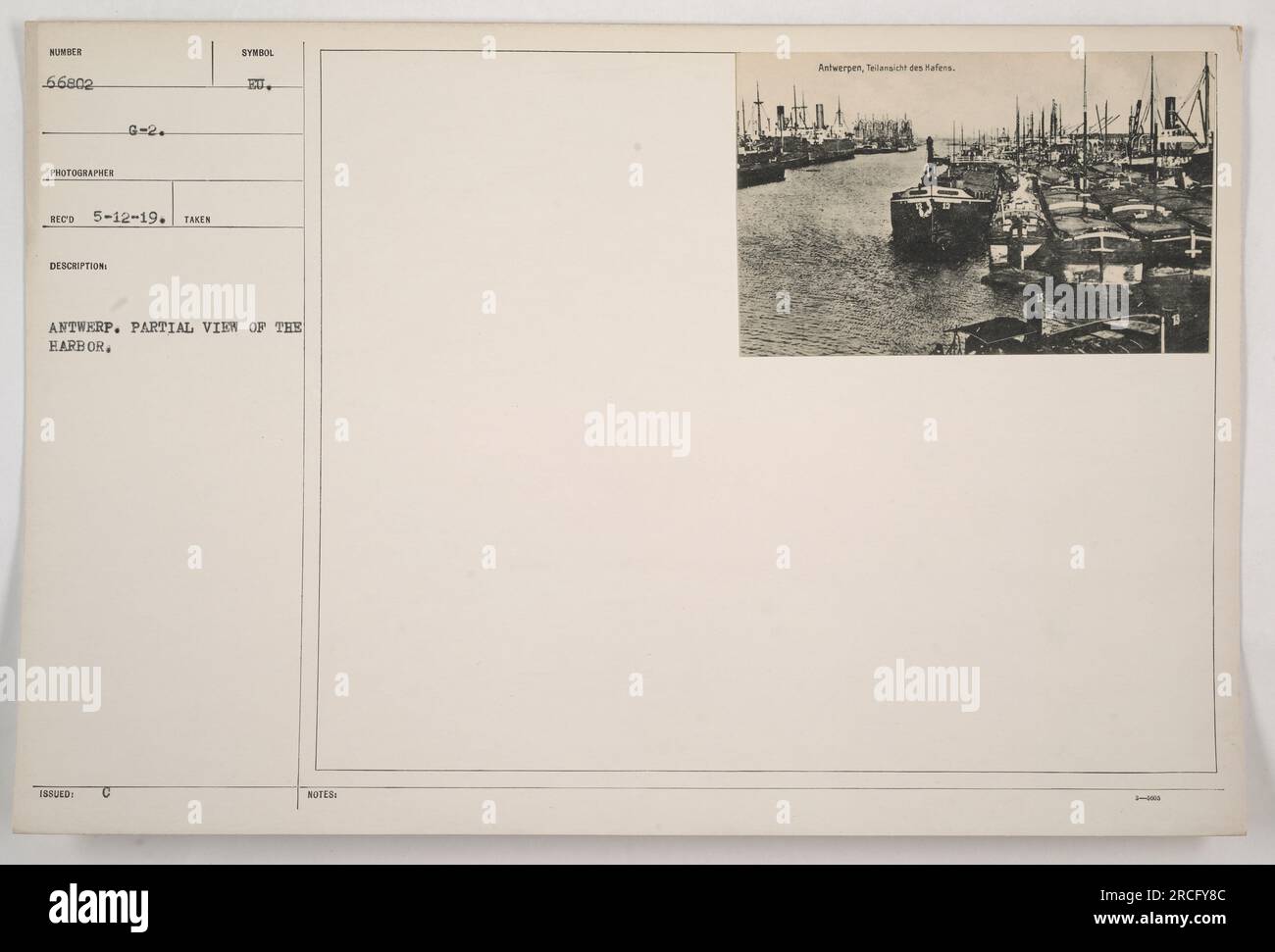 Partial view of the Antwerp Harbor, as captured in photograph number 66802 in the collection of American Military Activities during World War One. The photograph was taken by the photographer Reco on May 12, 1919. The image features a telansicht (bird's-eye view) of the harbor, with partial details visible. Stock Photo
