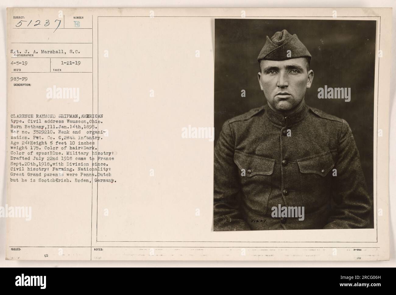 Clarence Raymond Shipman, an American soldier, is photographed in Boden, Germany. He was born in Bethany, Illinois on January 14, 1895, and was 24 years old at the time. Shipman served as a Pvt. in Co. C, 28th Infantry, with war identification number 3529210. He has dark hair and blue eyes, stands at 5 feet 10 inches tall, and weighs 175 pounds. Shipman was drafted on July 22, 1918, and arrived in France on September 20, 1918, with his division. Prior to his service, he worked in farming. Stock Photo