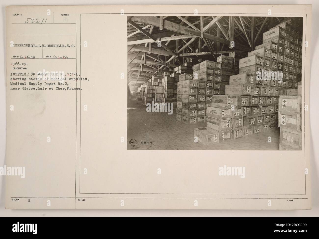 Caption: Interior view of Warehouse No. 131-B at Medical Supply Depot No. 2, located near Gievre, Loire et Cher, France. The photograph, taken on February 1, 1919, shows a substantial stock of medical supplies stored within the warehouse. This image is one of the numerous records from the Photographs of American Military Activities during World War One collection, captured by J. W. Crunelle. Stock Photo