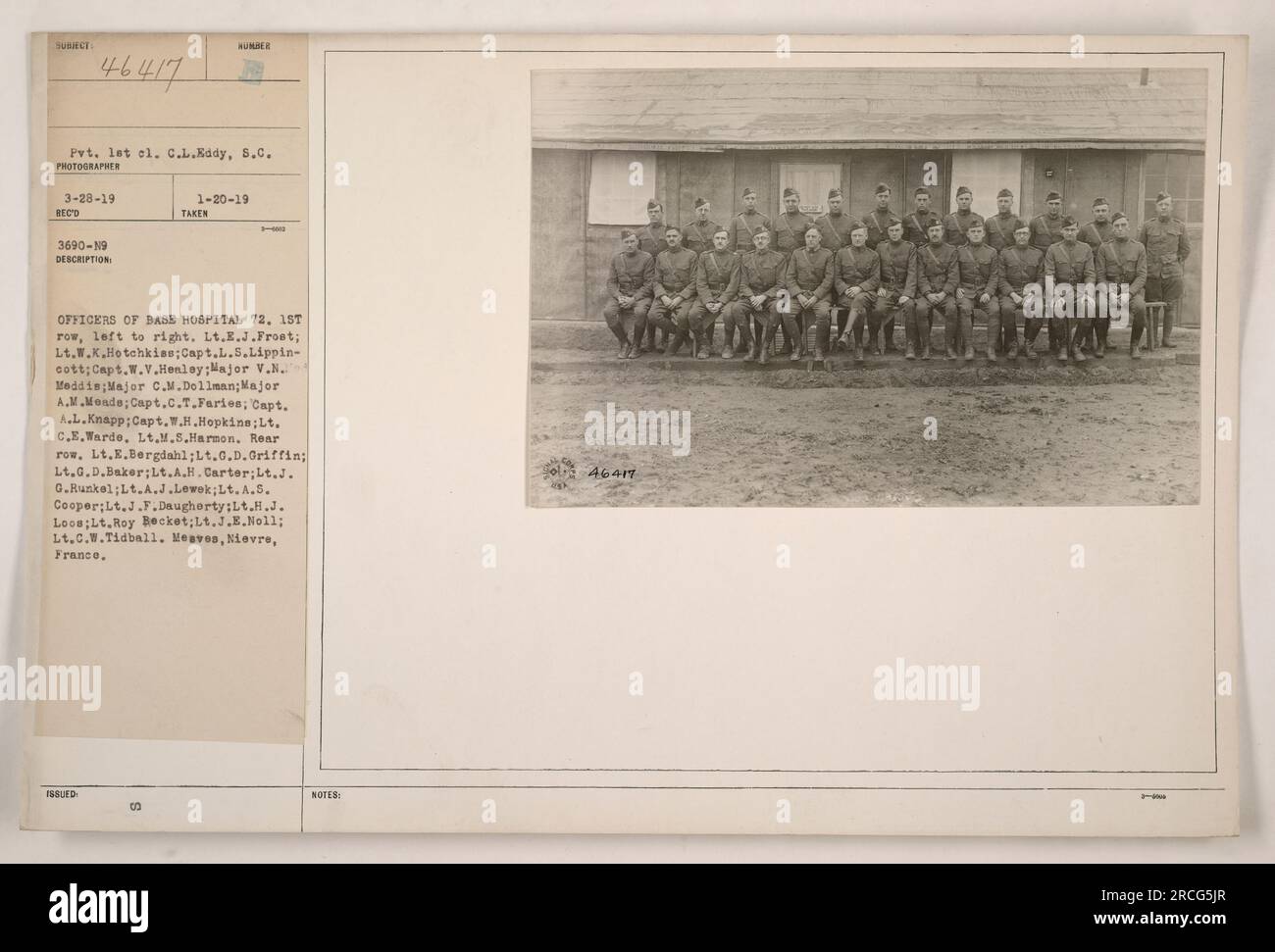Officers of Base Hospital 72. Front row, from left to right: Lt. E.J. Frost; Lt. W.K. Hotchkiss; Capt. L.S. Lippincott; Capt. W.V. Healey; Maj. V.N. Meddis; Maj. C.M. Dollman; Maj. A.M. Meads; Capt. C.T. Faries; Capt. A.L. Knapp; Capt. W.H. Hopkins; Lt. C.E. Warde. Lt. M.S. Harmon in center. Rear row: Lt. E.Bergdahl; Lt. G.D. Griffin; Lt. G.D. Baker; Lt. A.H. Carter; Lt. J.G. Runkel; Lt. A.J. Lewek; Lt. A.S. Cooper; Lt. J.F. Daughterty; Lt. H.J. Loos; Lt. Roy Becket; Lt. J.E. Noll; Lt. C.W. Tidball. Taken in Mesves, Nievre, France. Photographer: Pvt. 1st cl. C.L. Eddy, S.C. Date taken: 1-20-19 Stock Photo