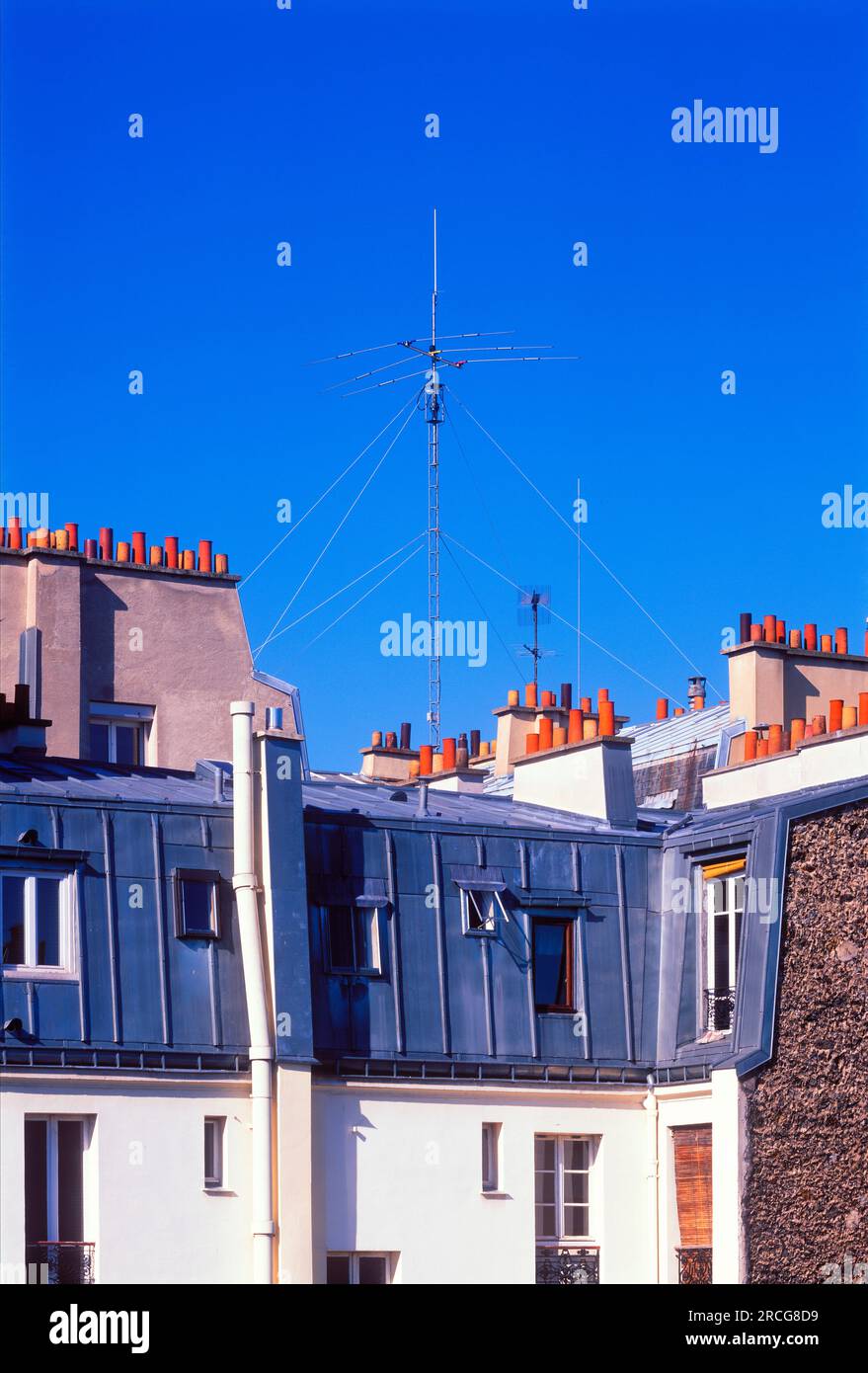 TV antenna on rooftop, Paris, France Stock Photo