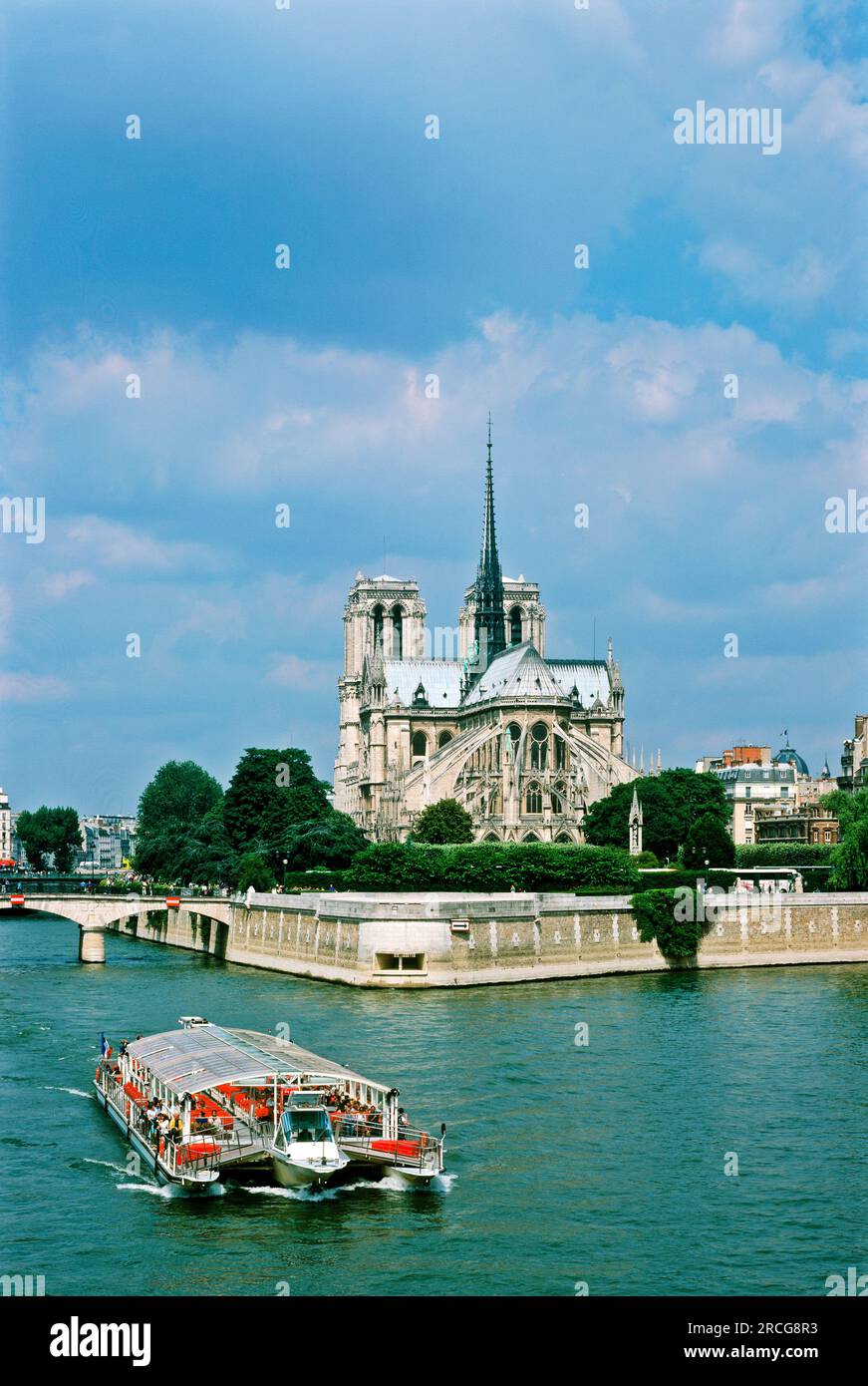 Boat on river near Notre Dame, Paris, France Stock Photo
