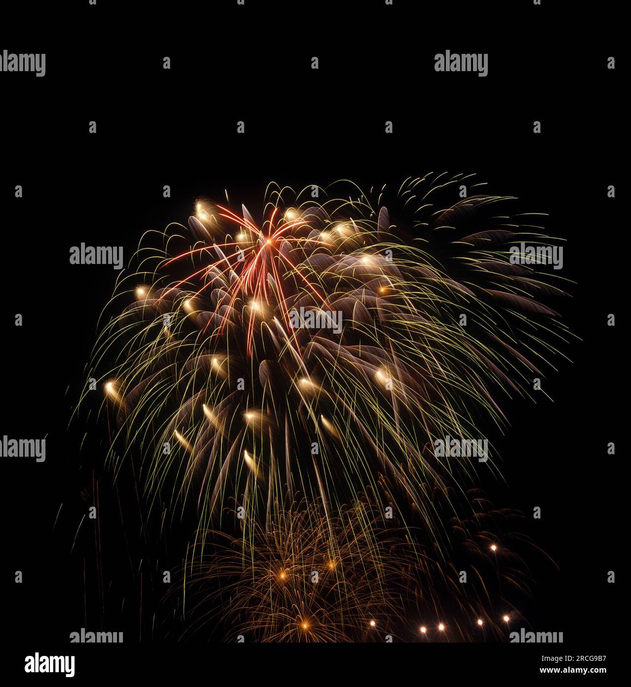 Firework display in night sky Stock Photo