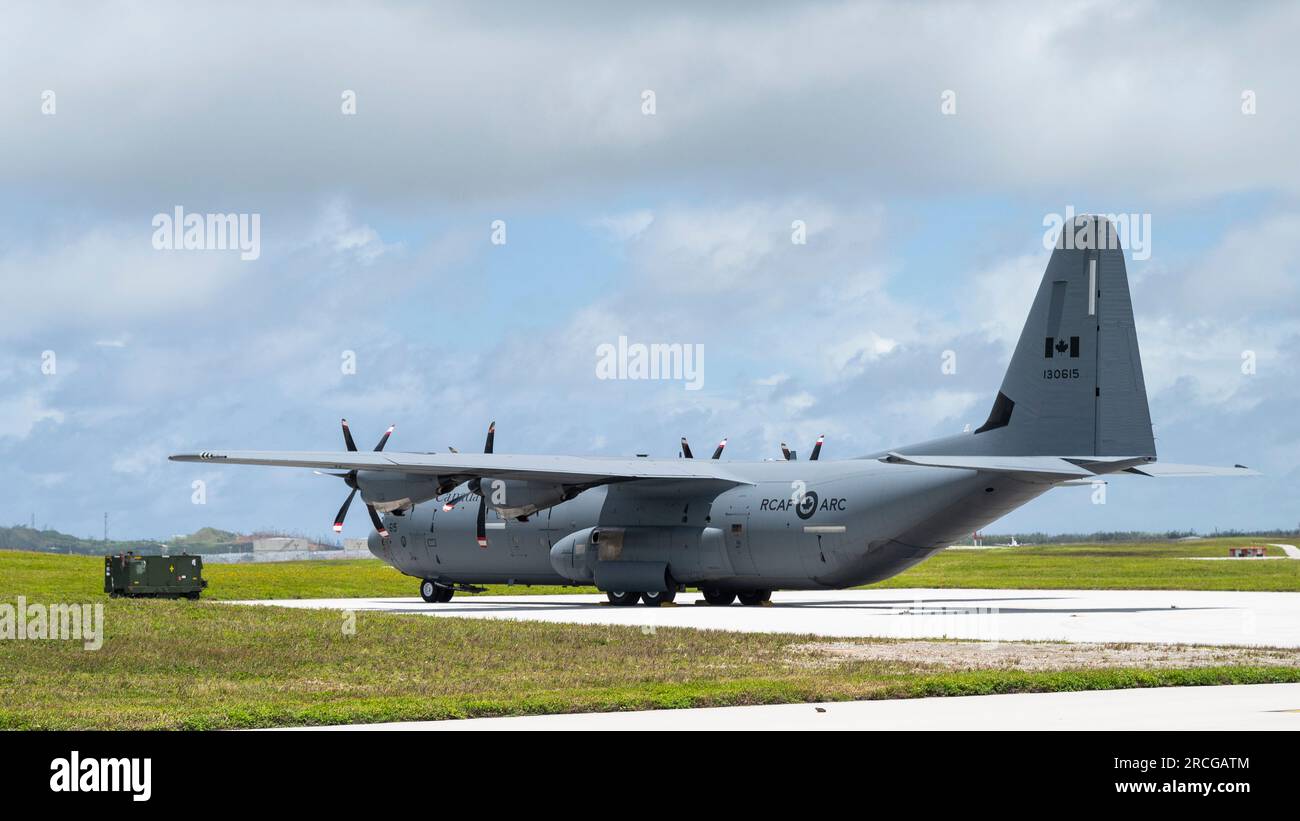 A Royal Canadian Air Force CC-130J assigned to the 436 Transport Squadron, from 8 Wing Trenton in Trenton, Ontario, rests on the flight line during Mobility Guardian 23 at Andersen Air Force Base, Guam, July 9, 2023. MG23 is an opportunity to train alongside our Allies and partners to demonstrate interoperability and bolster our collective ability to support a free and open Indo-Pacific. (U.S. Air Force photo by Tech. Sgt. Joseph Pick) Stock Photo
