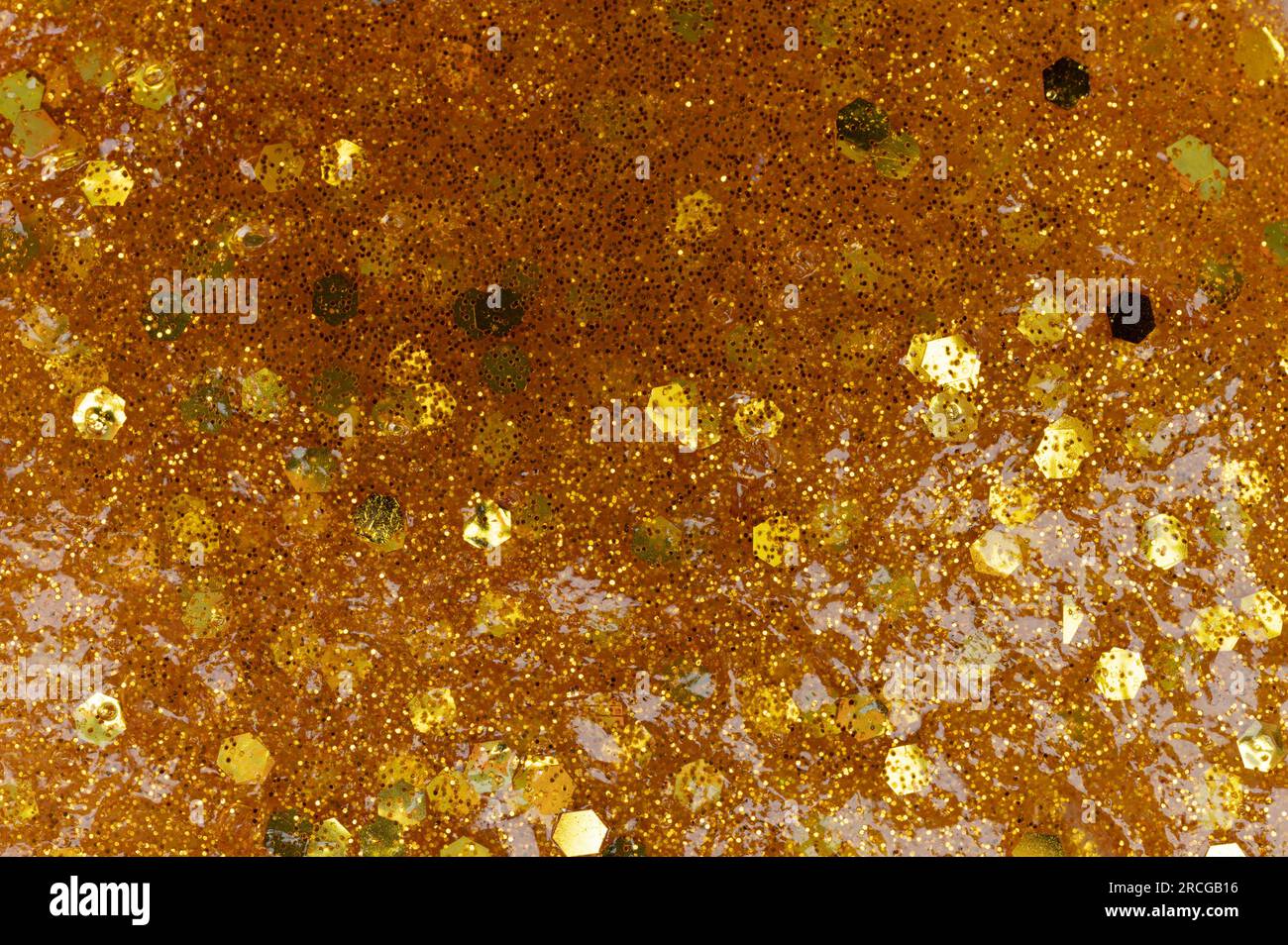 Shiny glitter slime pattern macro close up view Stock Photo