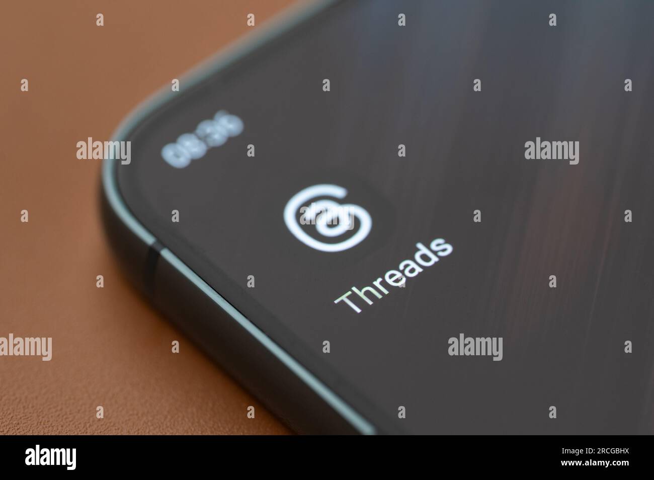 New York, USA - July 7, 2023: Threads icon app logo on smartphone screen close up view Stock Photo