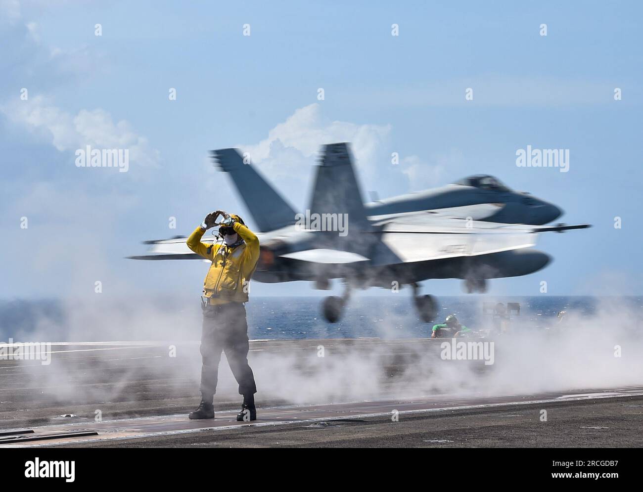 230711-N-JO823-1138 INDIAN OCEAN (July 11, 2023) An F/A-18E Super Hornet, attached to the Dambusters of Strike Fighter Squadron (VFA) 195, launches from the flight deck of the U.S. Navy’s only forward-deployed aircraft carrier, USS Ronald Reagan (CVN 76), in the Indian Ocean, July 11, 2023. The Dambusters earned their nickname on May 1, 1951 when the squadron's Skyraiders destroyed the heavily defended and strategically positioned Hwacheon Dam in North Korea with aerial torpedoes by making precise low level runs. Ronald Reagan, the flagship of Carrier Strike Group 5, provides a combat-ready fo Stock Photo