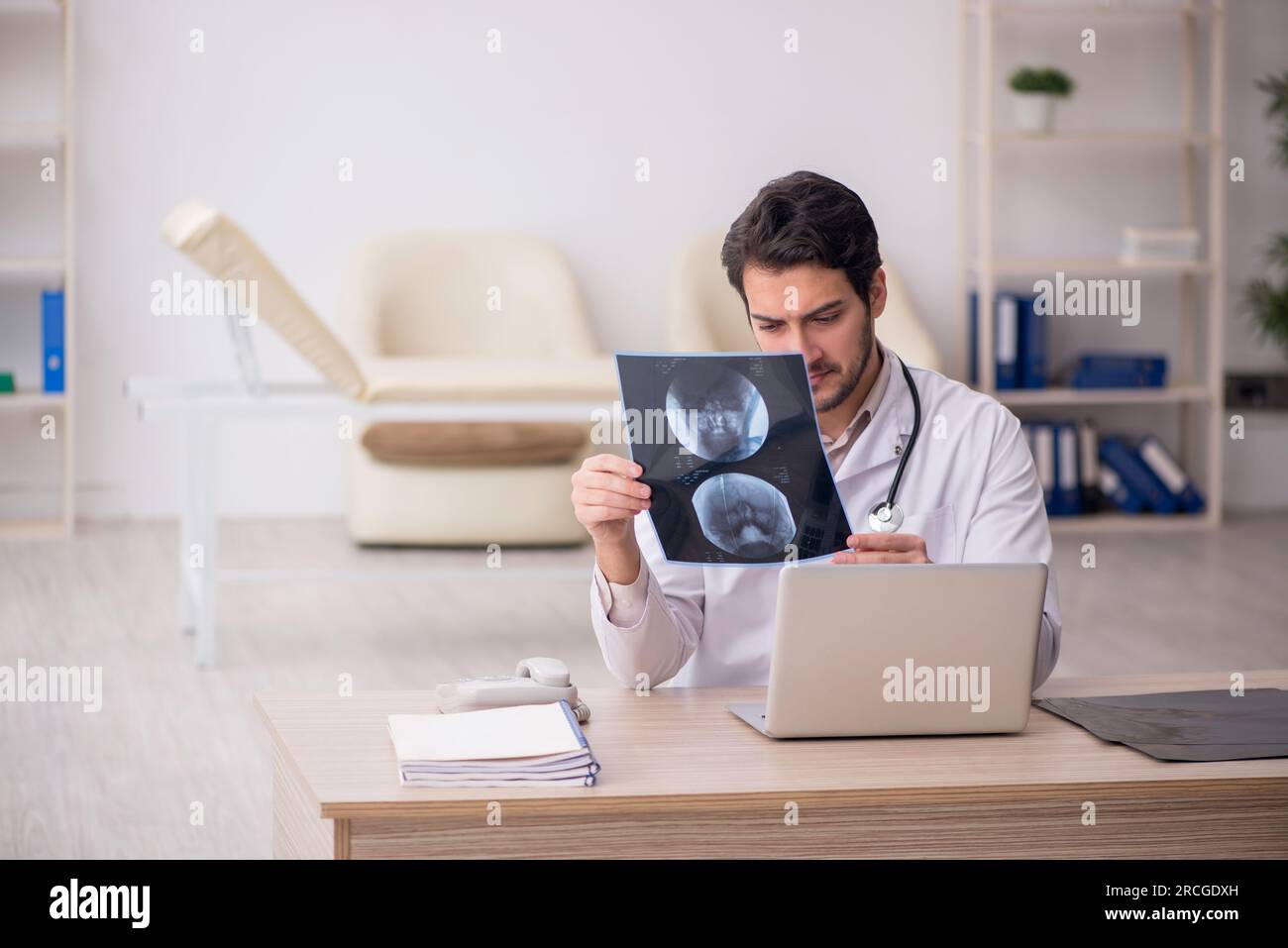 Young doctor radiologist working at the hospital Stock Photo