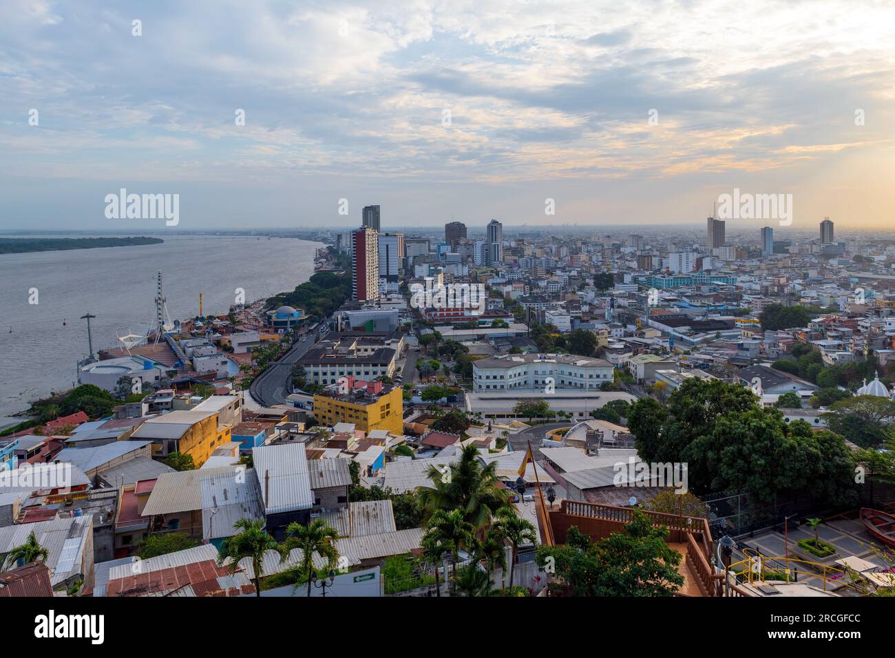 Guayaquil city at sunset with Guayas river and skyscraper skyline cityscape, Guayaquil, Ecuador. Stock Photo